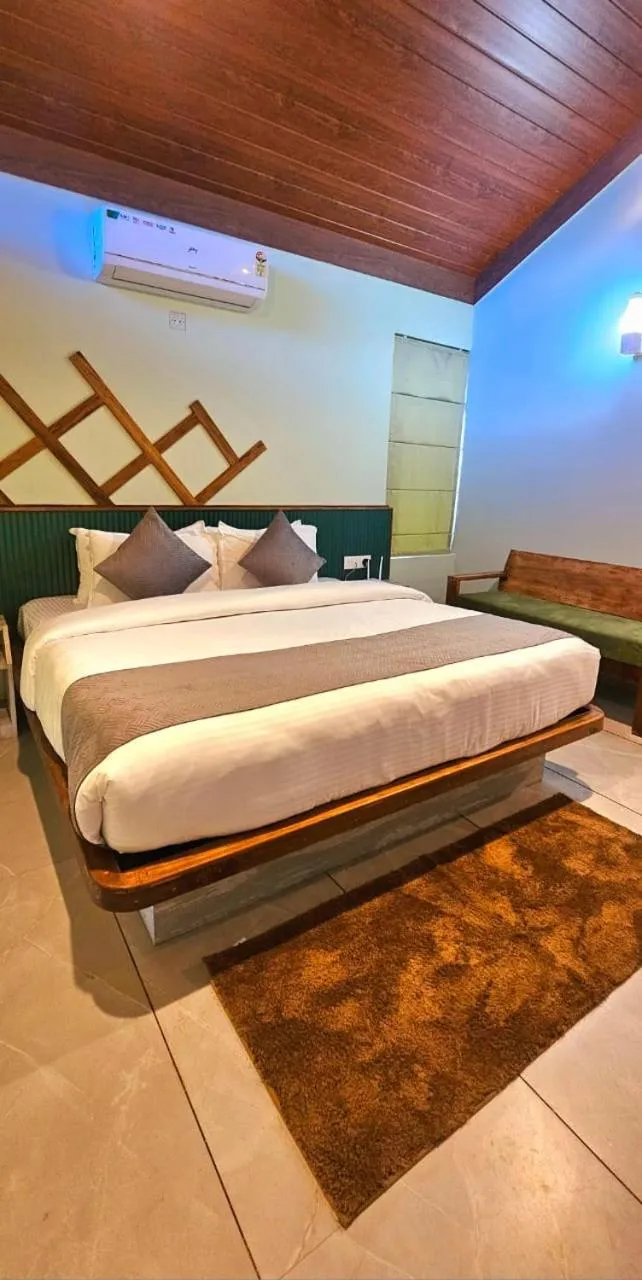 Bed in Vythiri Holiday Resort, Wayanad