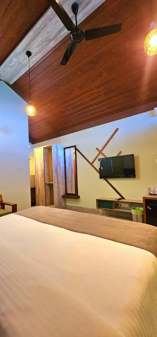 Bed in Vythiri Holiday Resort, Wayanad