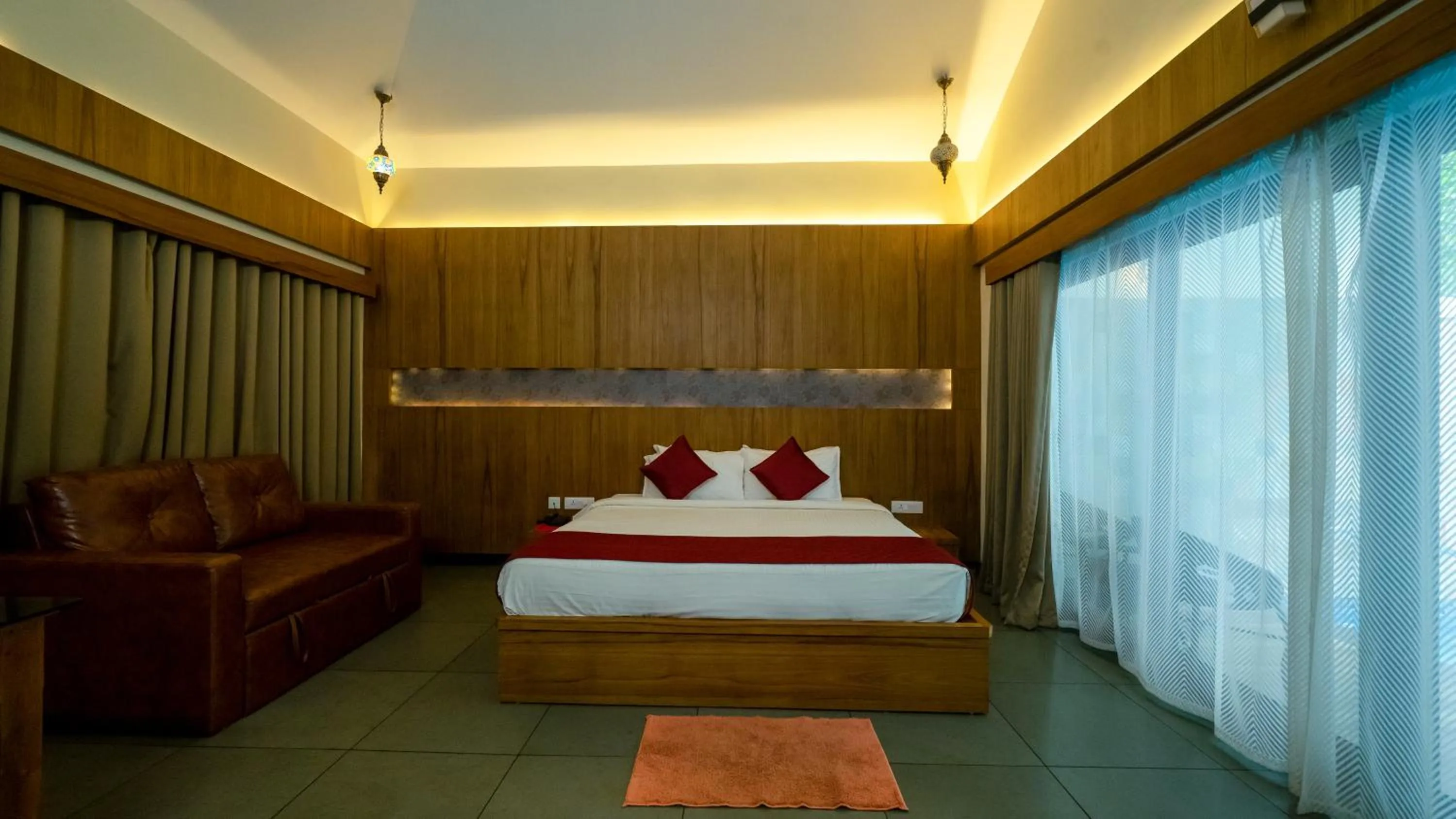 Bed in Vythiri Holiday Resort, Wayanad