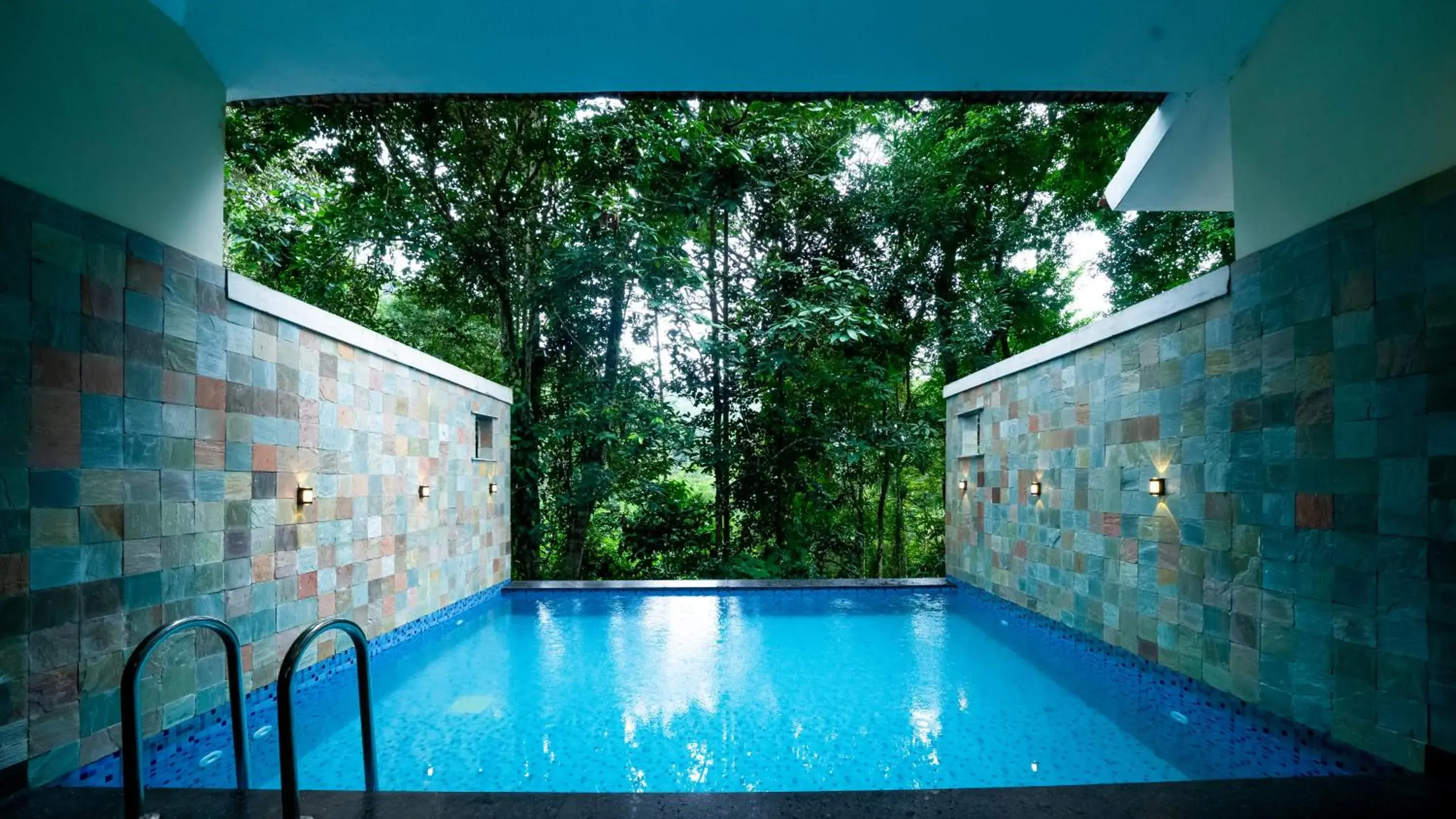 Swimming pool in Vythiri Holiday Resort, Wayanad Swimming pool in Vythiri Holiday Resort, Wayanad