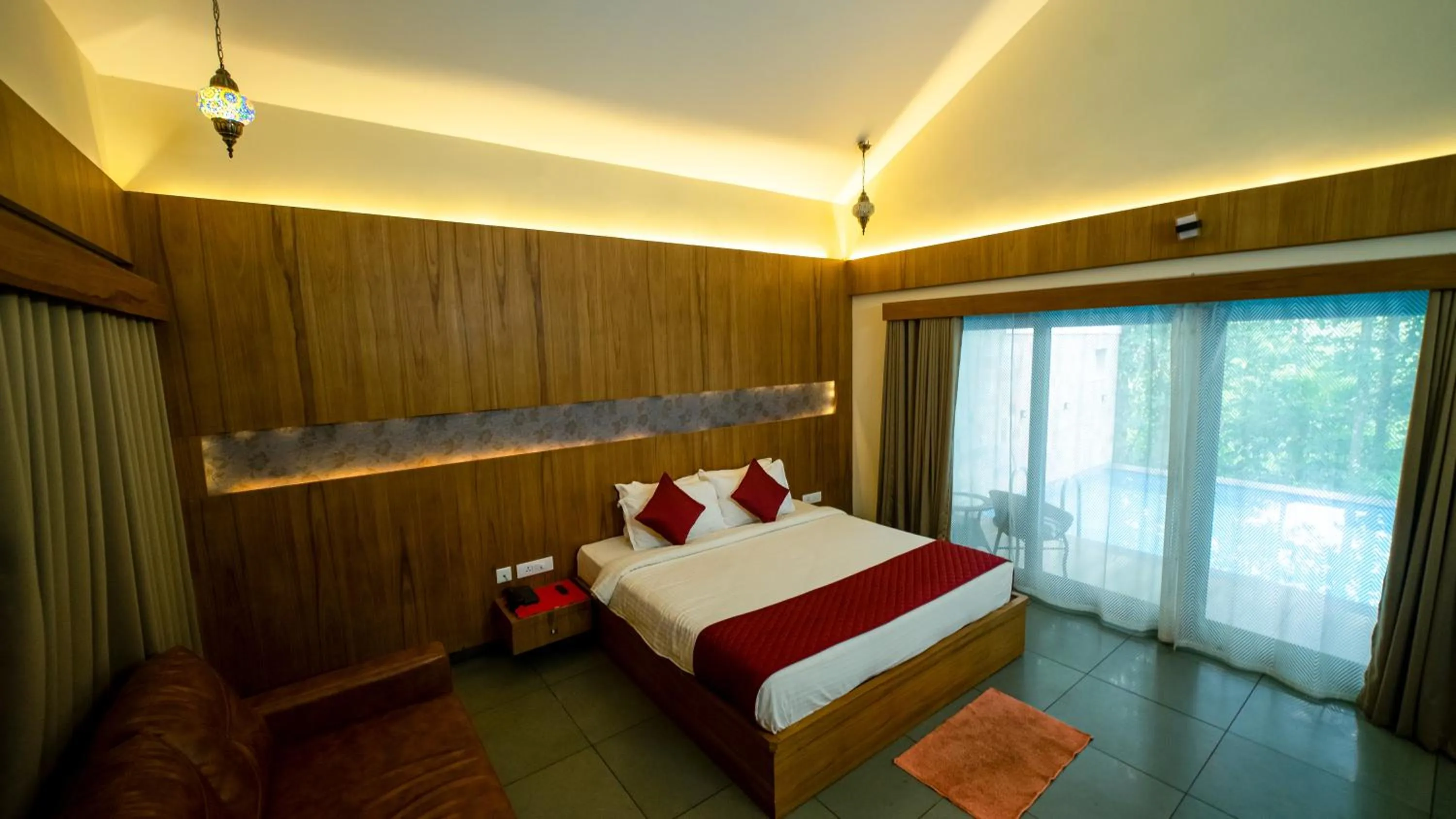 Bed in Vythiri Holiday Resort, Wayanad