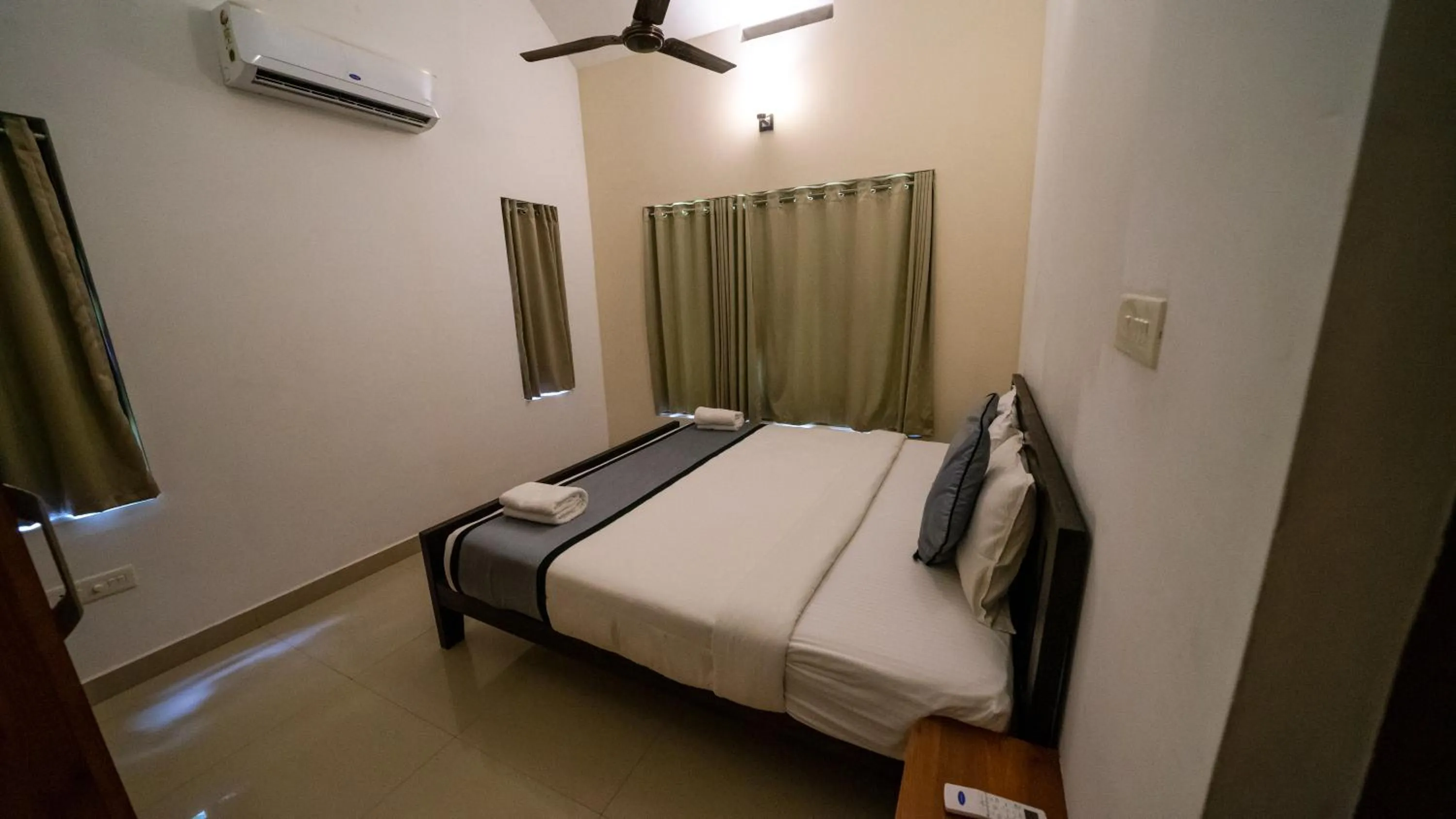 Bed in Vythiri Holiday Resort, Wayanad