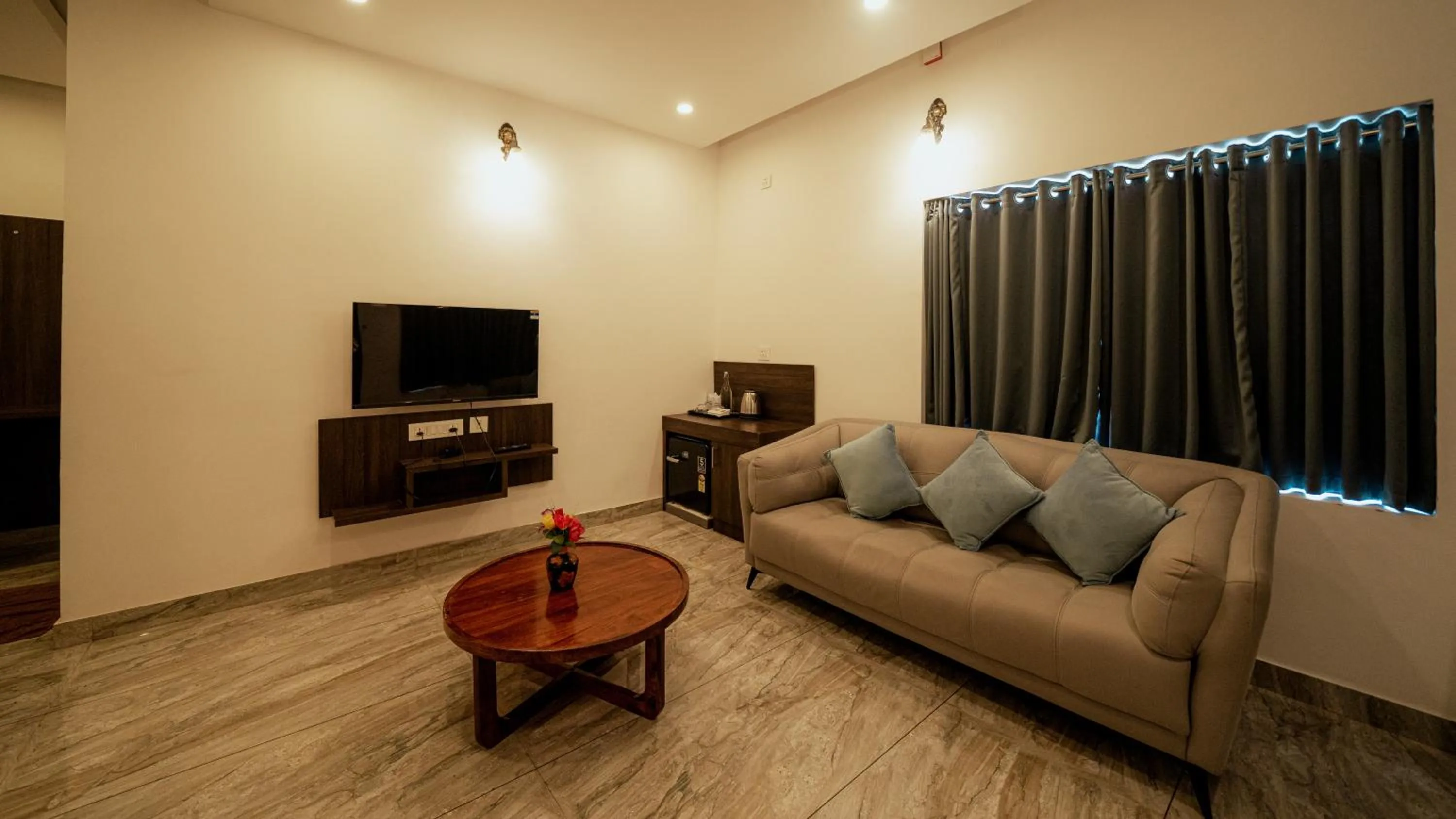 Seating area in Vythiri Holiday Resort, Wayanad