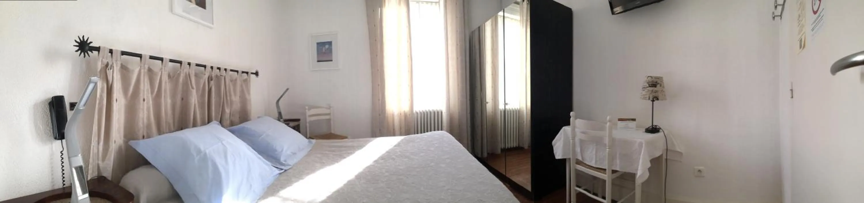 Photo of the whole room, Bed in Hôtel Restaurant Les Touristes