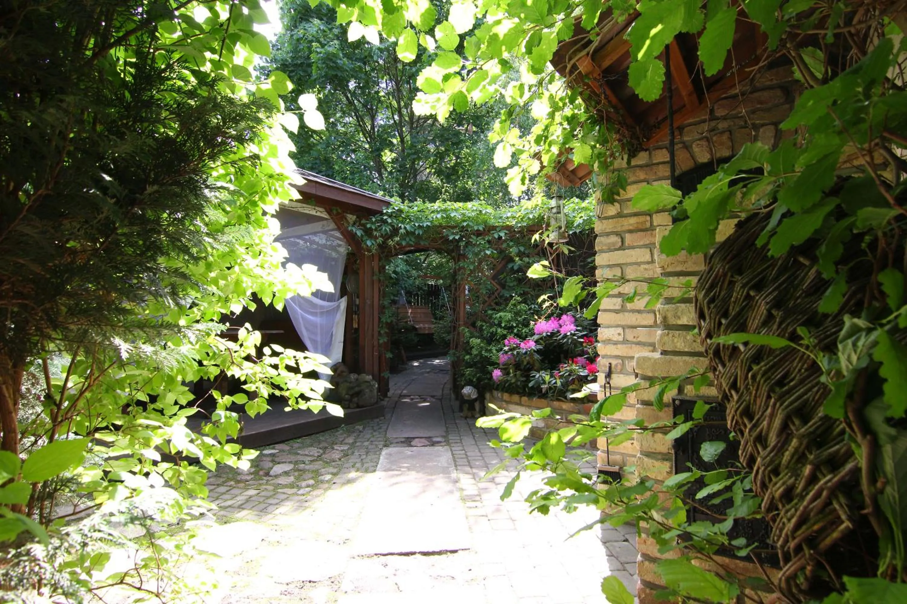 Garden in Apartamenty pod Wiciokrzewem
