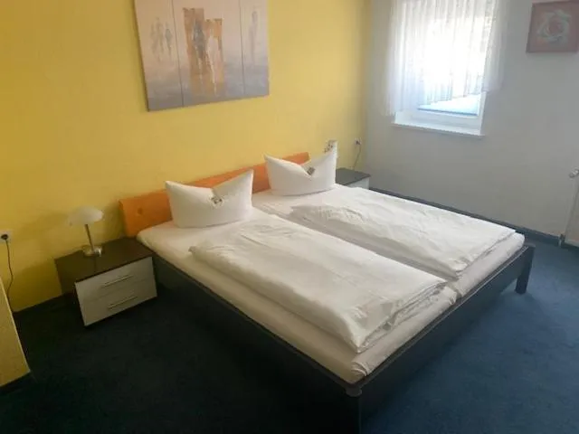 Bed in Hotel Schwarzes Ross Siebenlehn