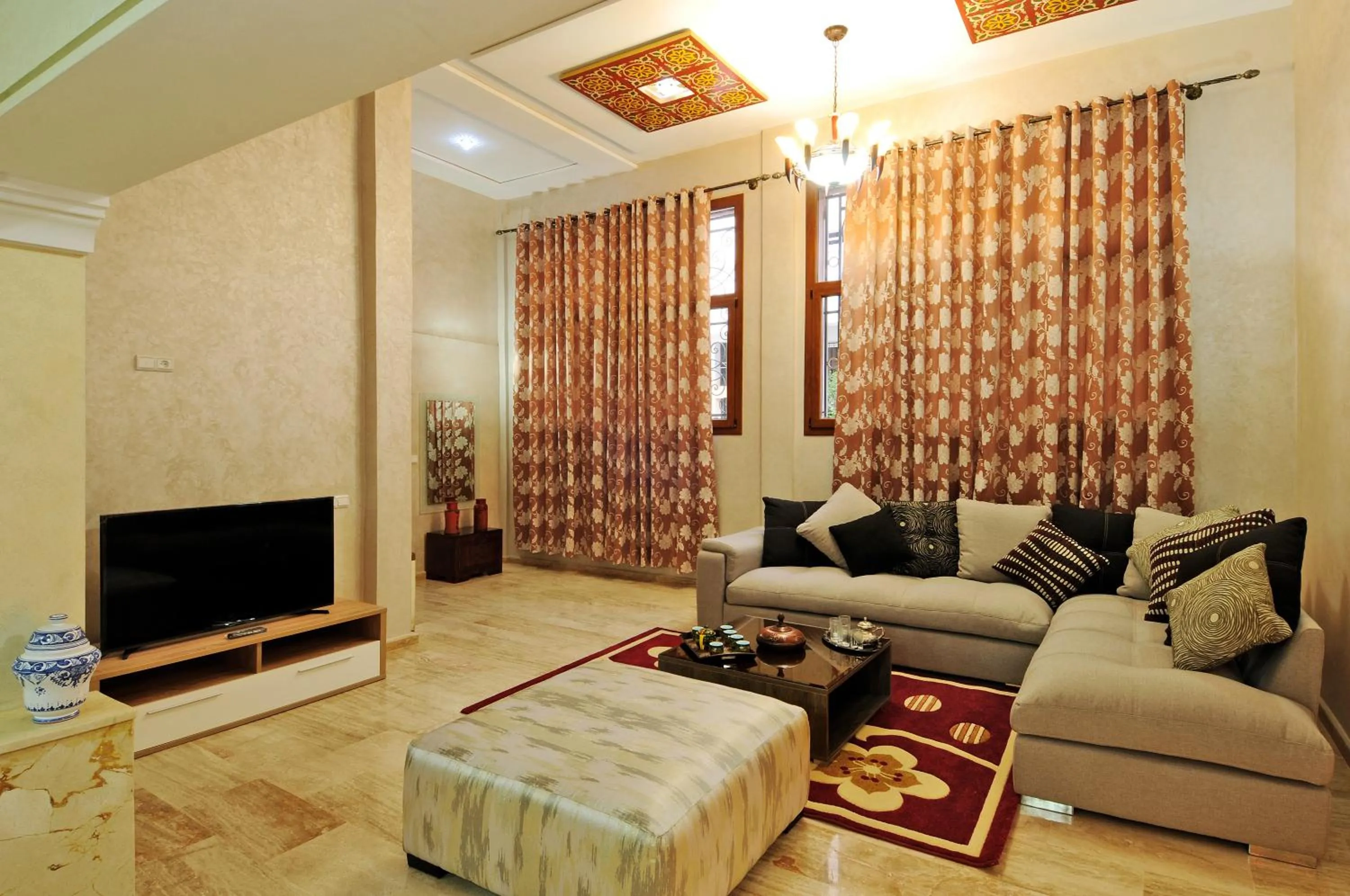 Communal lounge/ TV room in Aparthotel Les Oliviers Suites & Spa