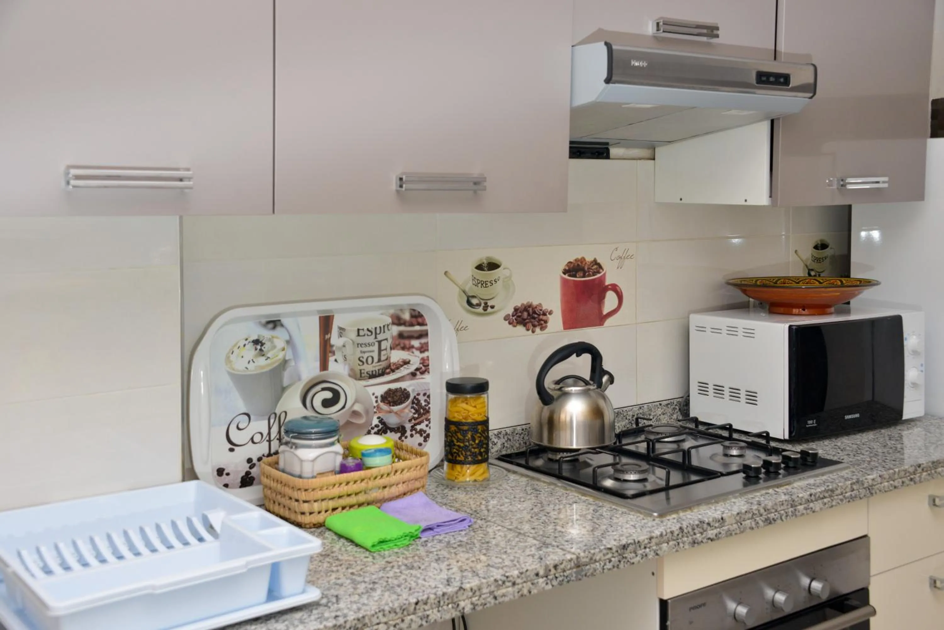 Kitchen or kitchenette in Aparthotel Les Oliviers Suites & Spa
