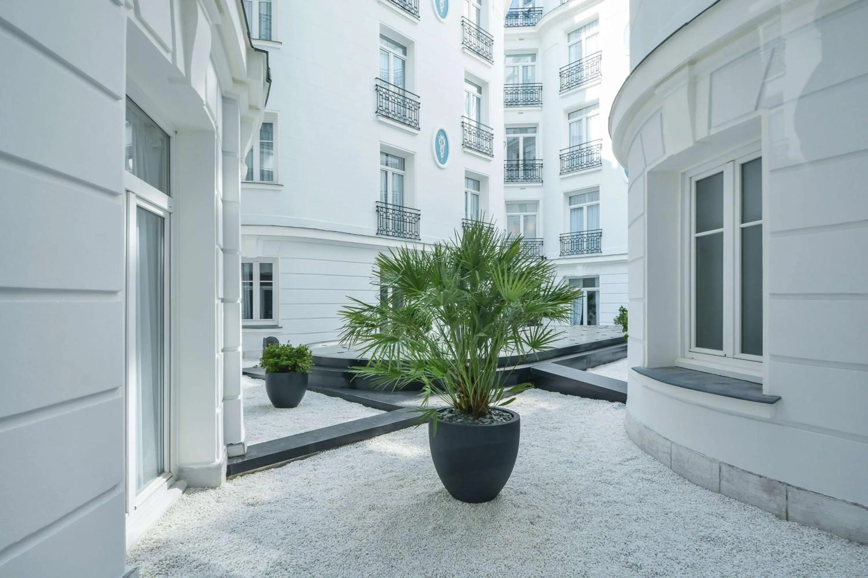 Inner courtyard view in Maison Astor Paris, Curio Collection by Hilton
