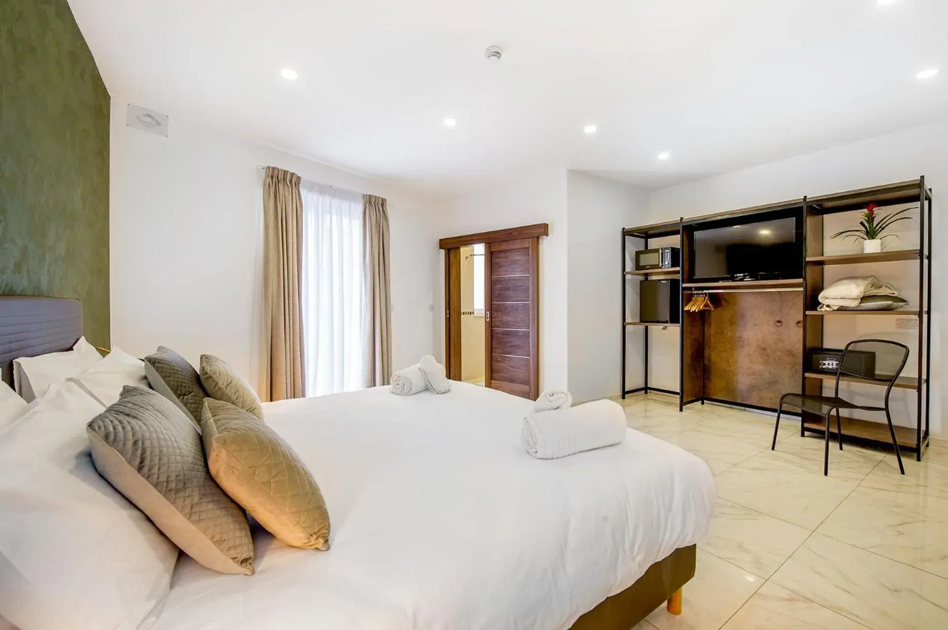 Photo of the whole room, Bed in South Wind Guesthouse Photo of the whole room, Bed in South Wind Guesthouse