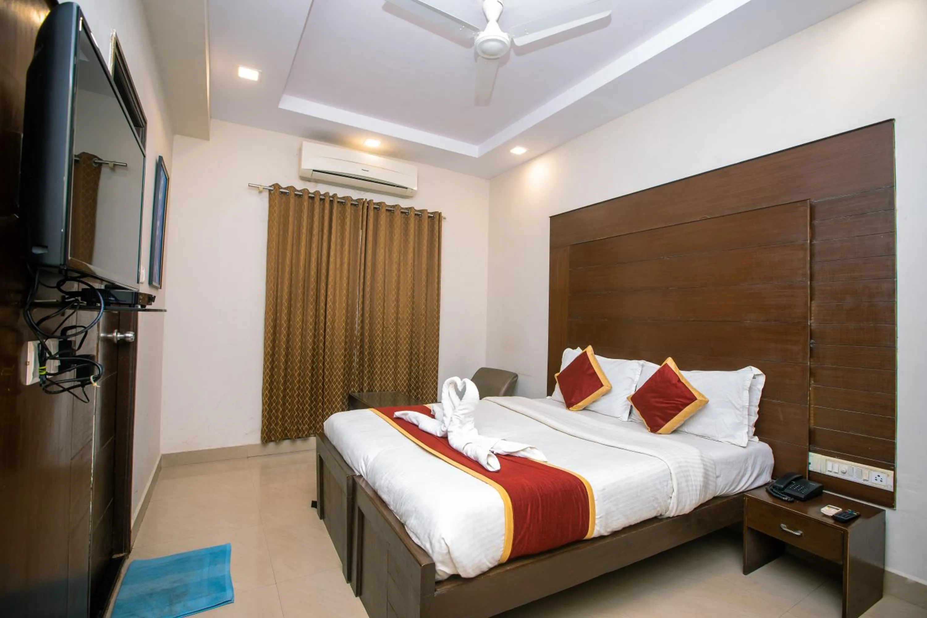 Photo of the whole room, Bed in Orion Residency Hotel Near Chennai Central Railway Station