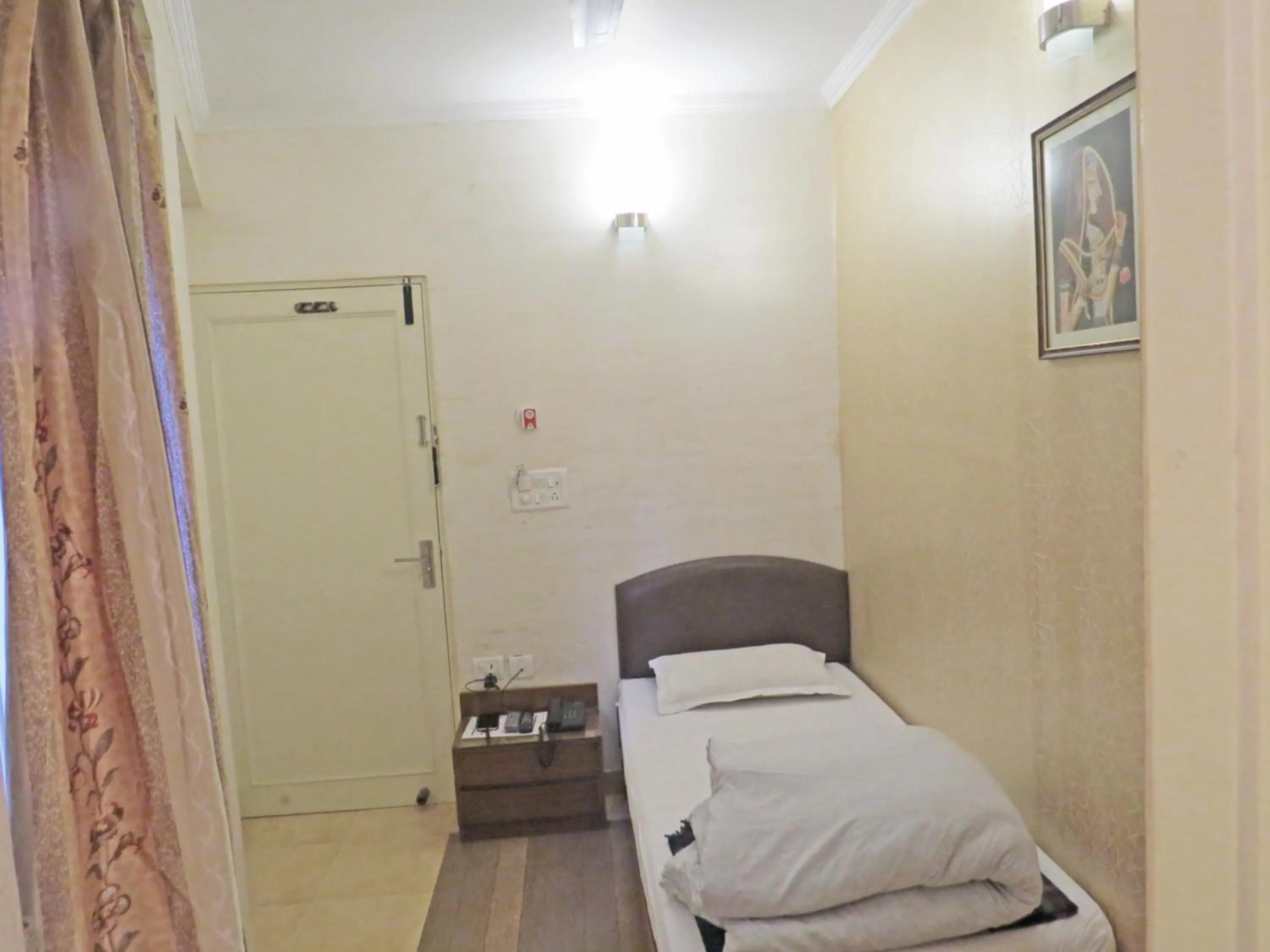 Bed in Hotel Rangoli