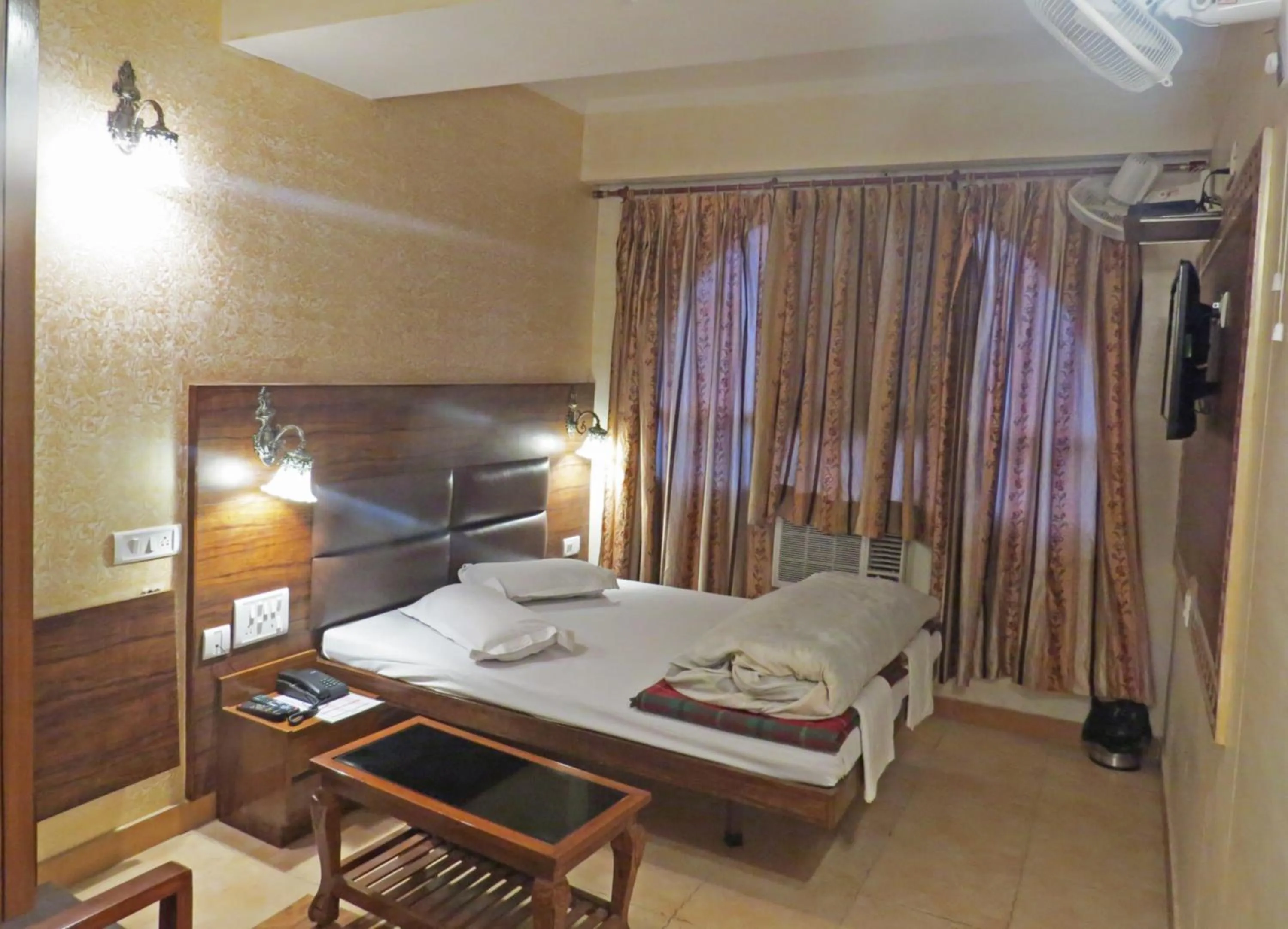 Bed in Hotel Rangoli