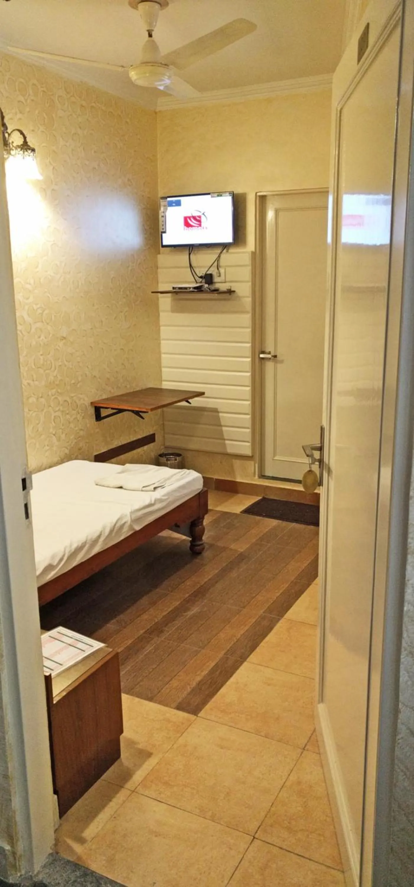 Bed in Hotel Rangoli