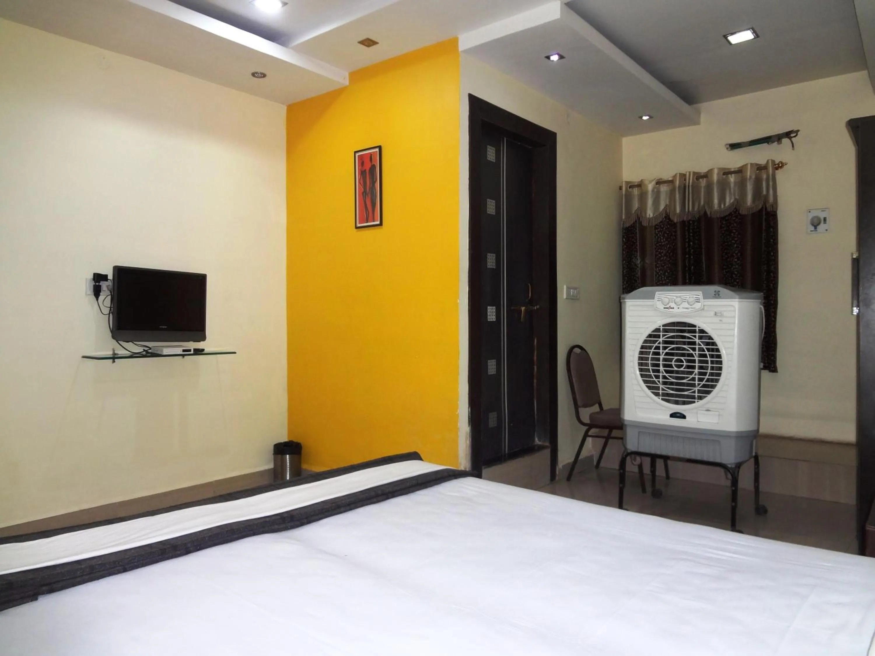 Bed in Hotel Parvati Palace Sehore