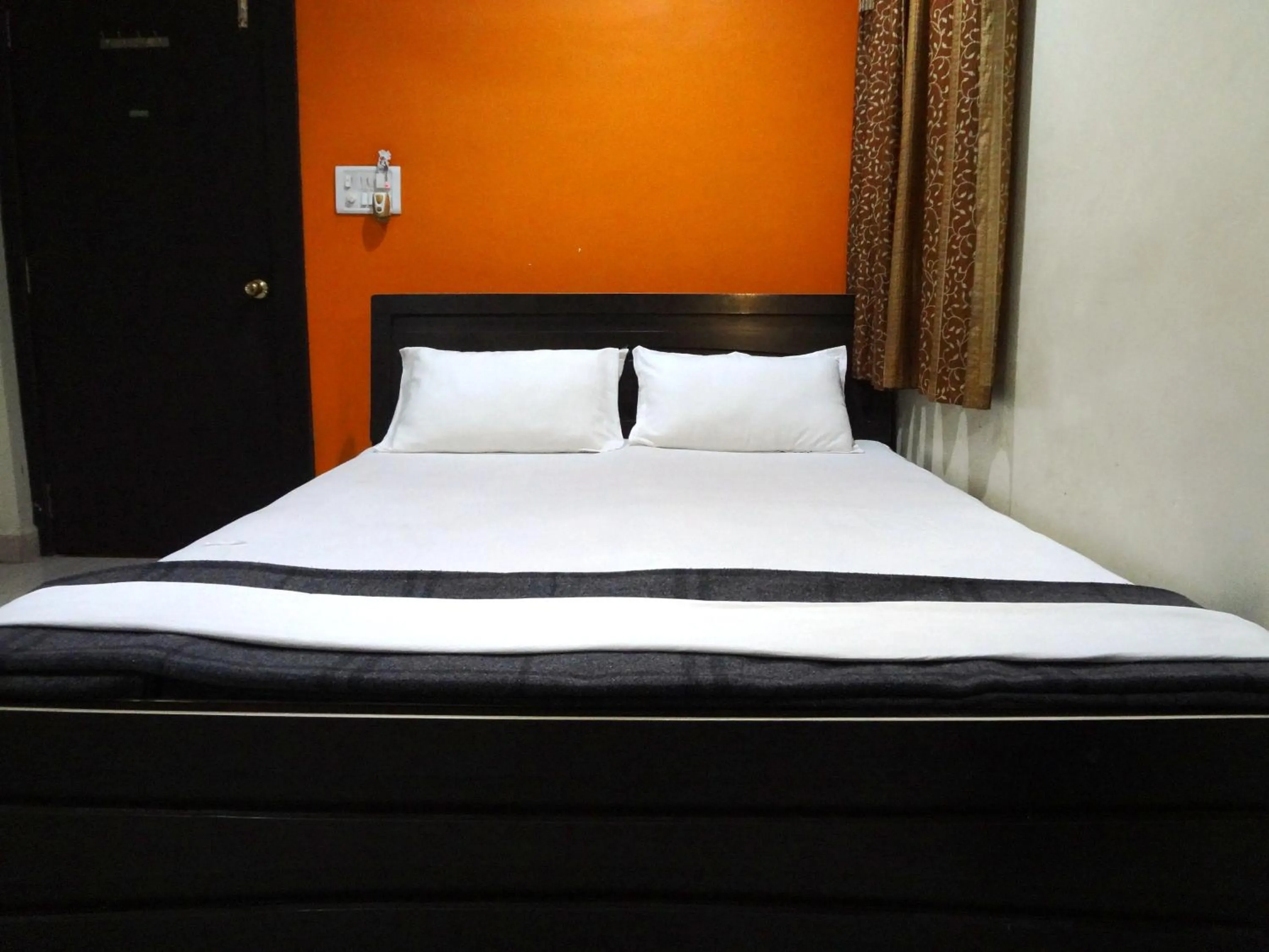 Bed in Hotel Parvati Palace Sehore