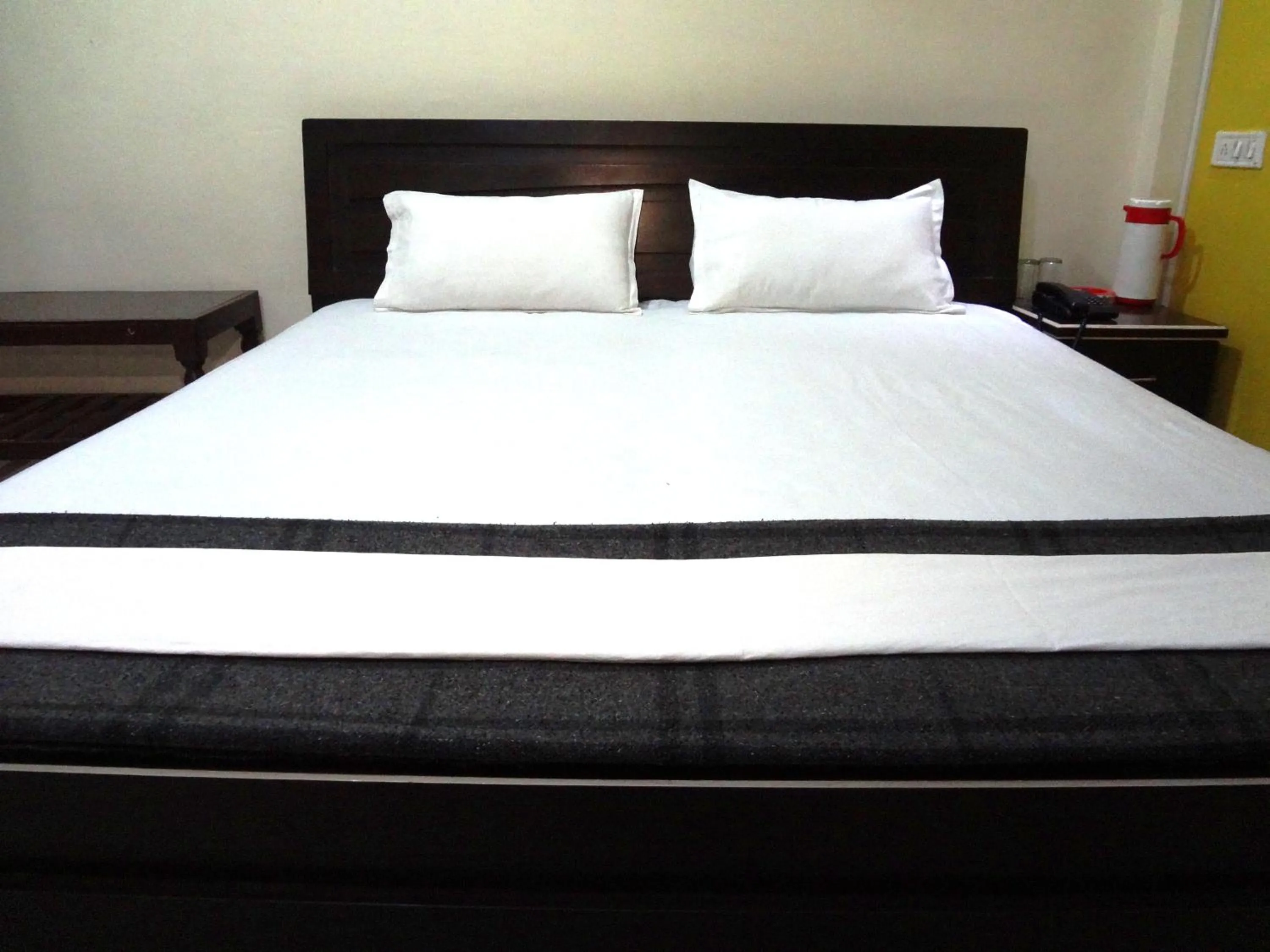 Bed in Hotel Parvati Palace Sehore