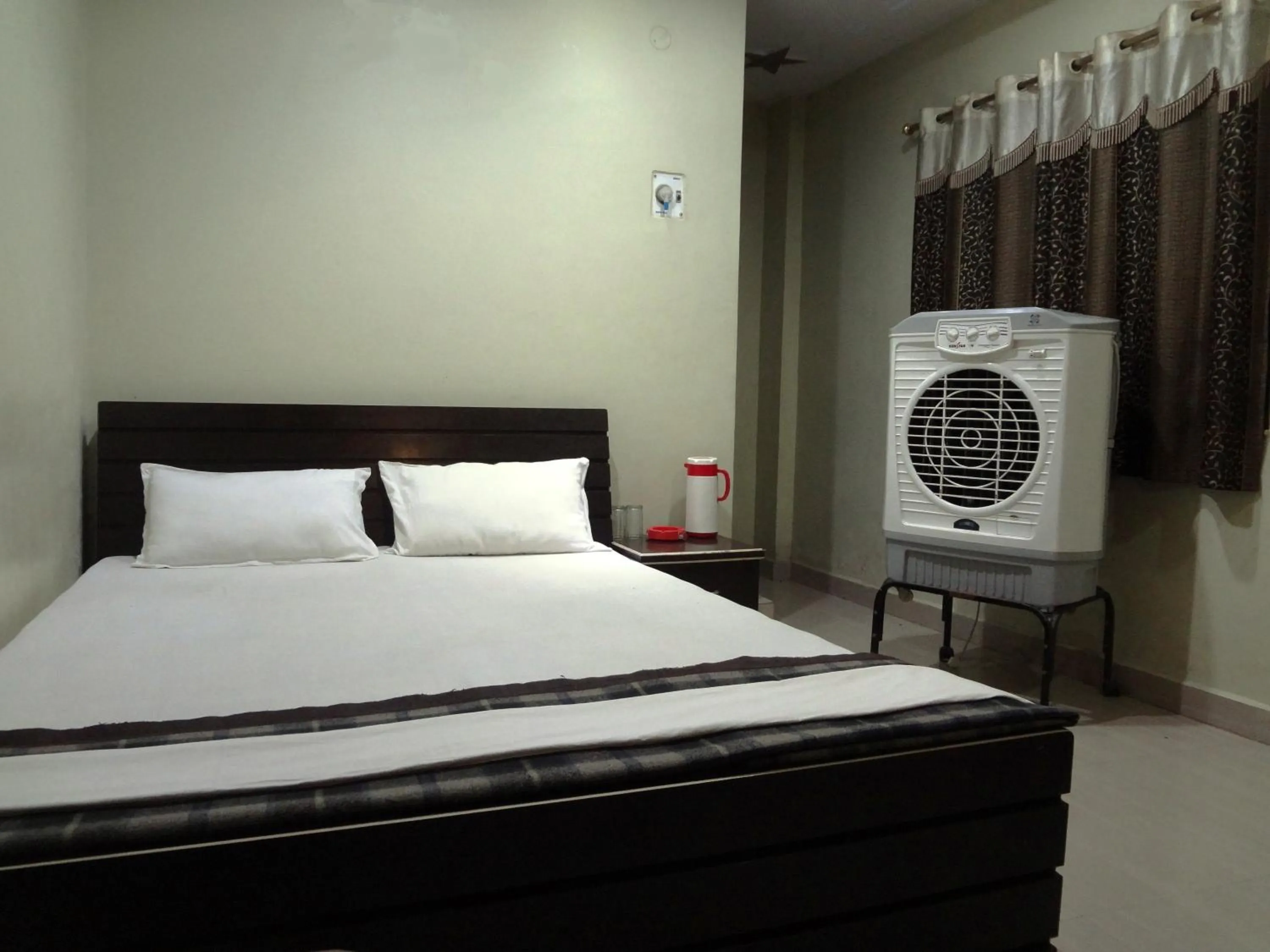 Bed in Hotel Parvati Palace Sehore