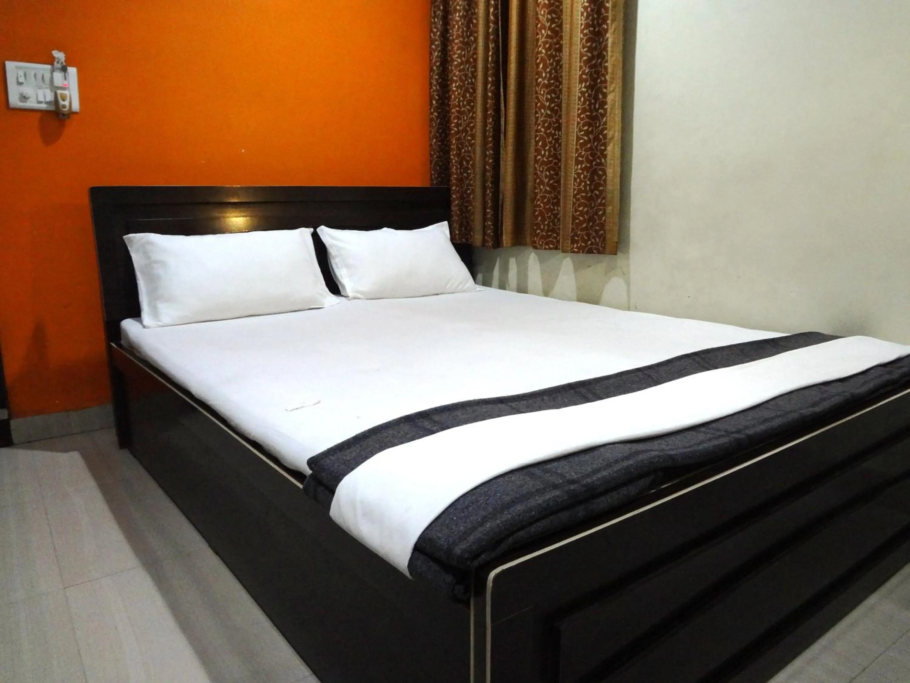 Bed in Hotel Parvati Palace Sehore