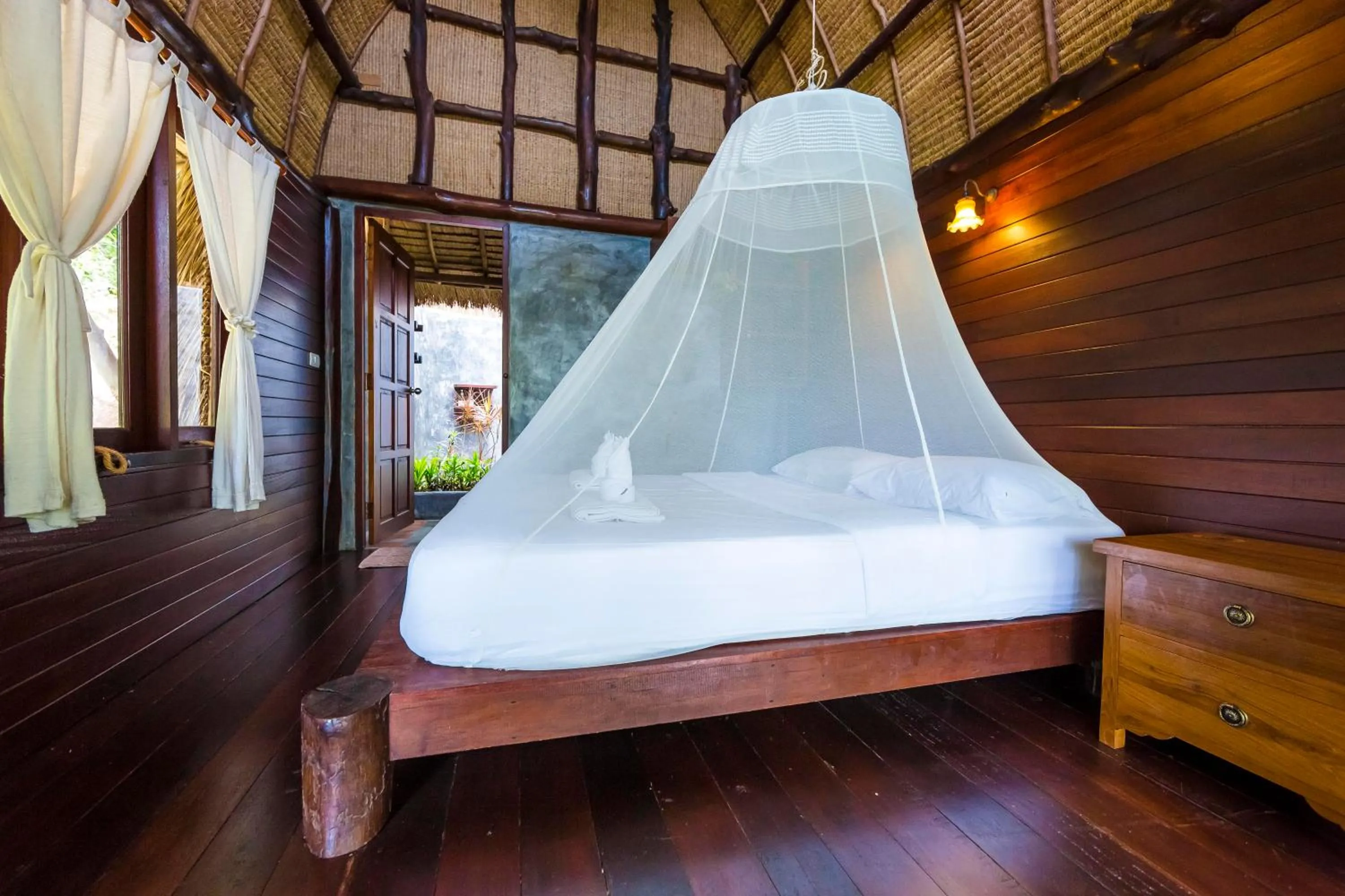Bed in Baan Talay Resort & Yoga