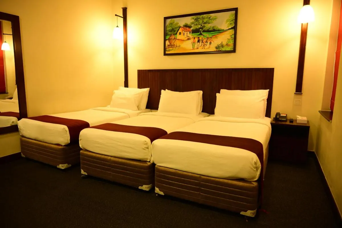 Bed in Hotel Nippon Colombo
