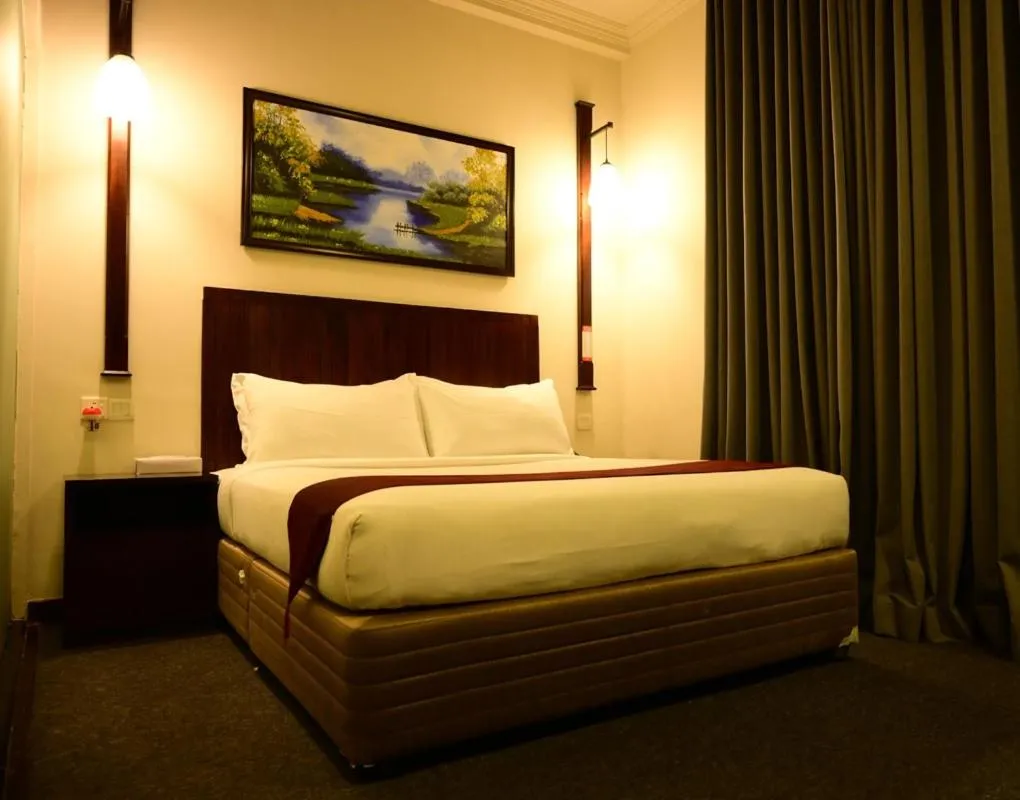 Bed in Hotel Nippon Colombo