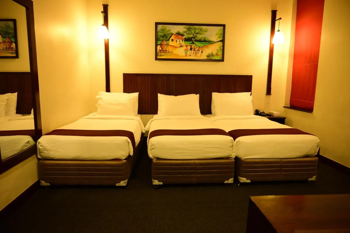 Bed in Hotel Nippon Colombo