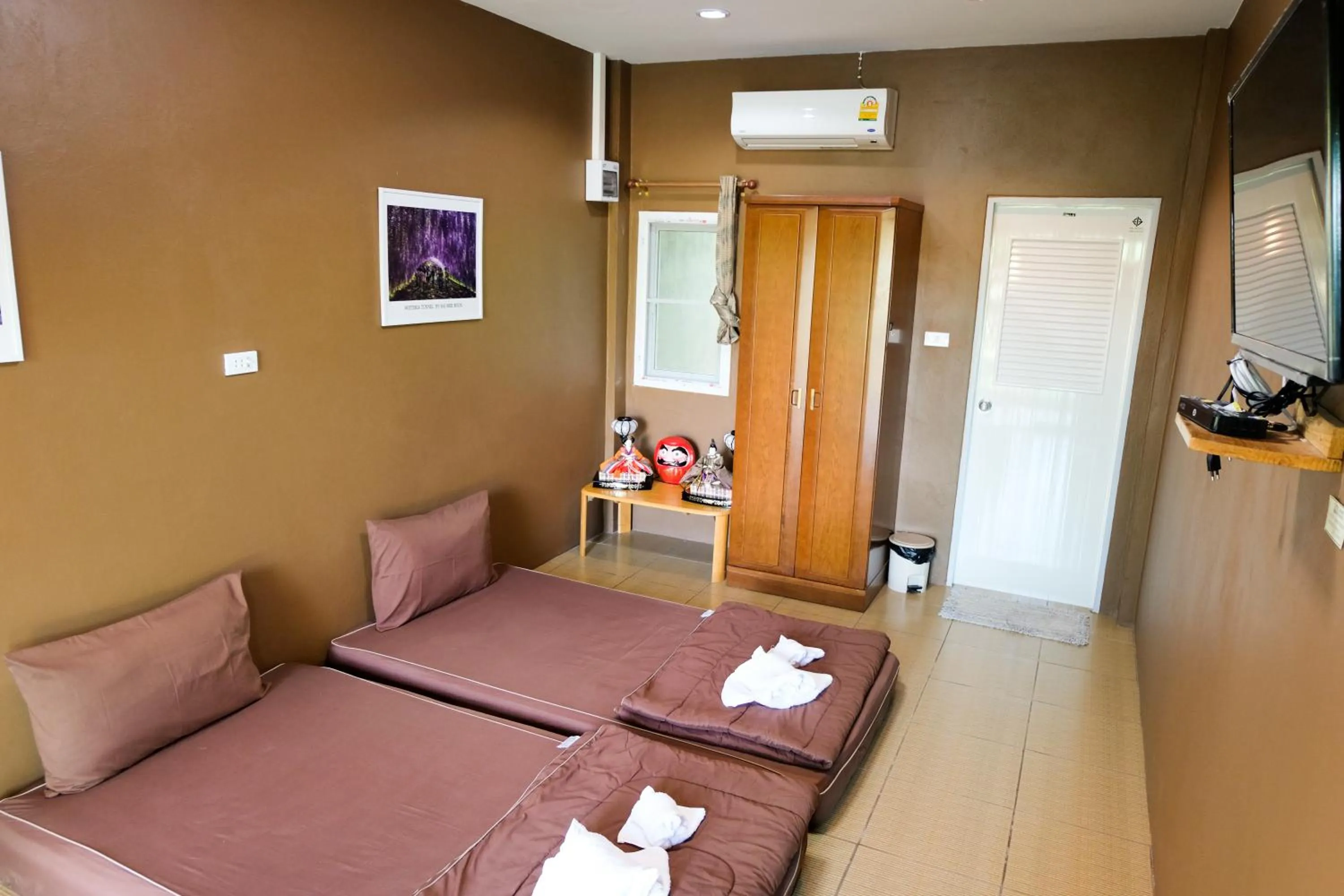 Photo of the whole room, Bed in Tanihill Resort