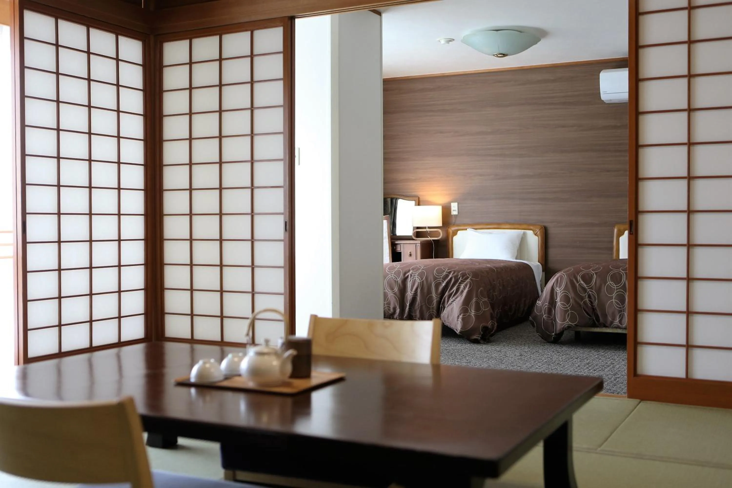 Photo of the whole room, Bed in Okutsu Onsen Komeya Club