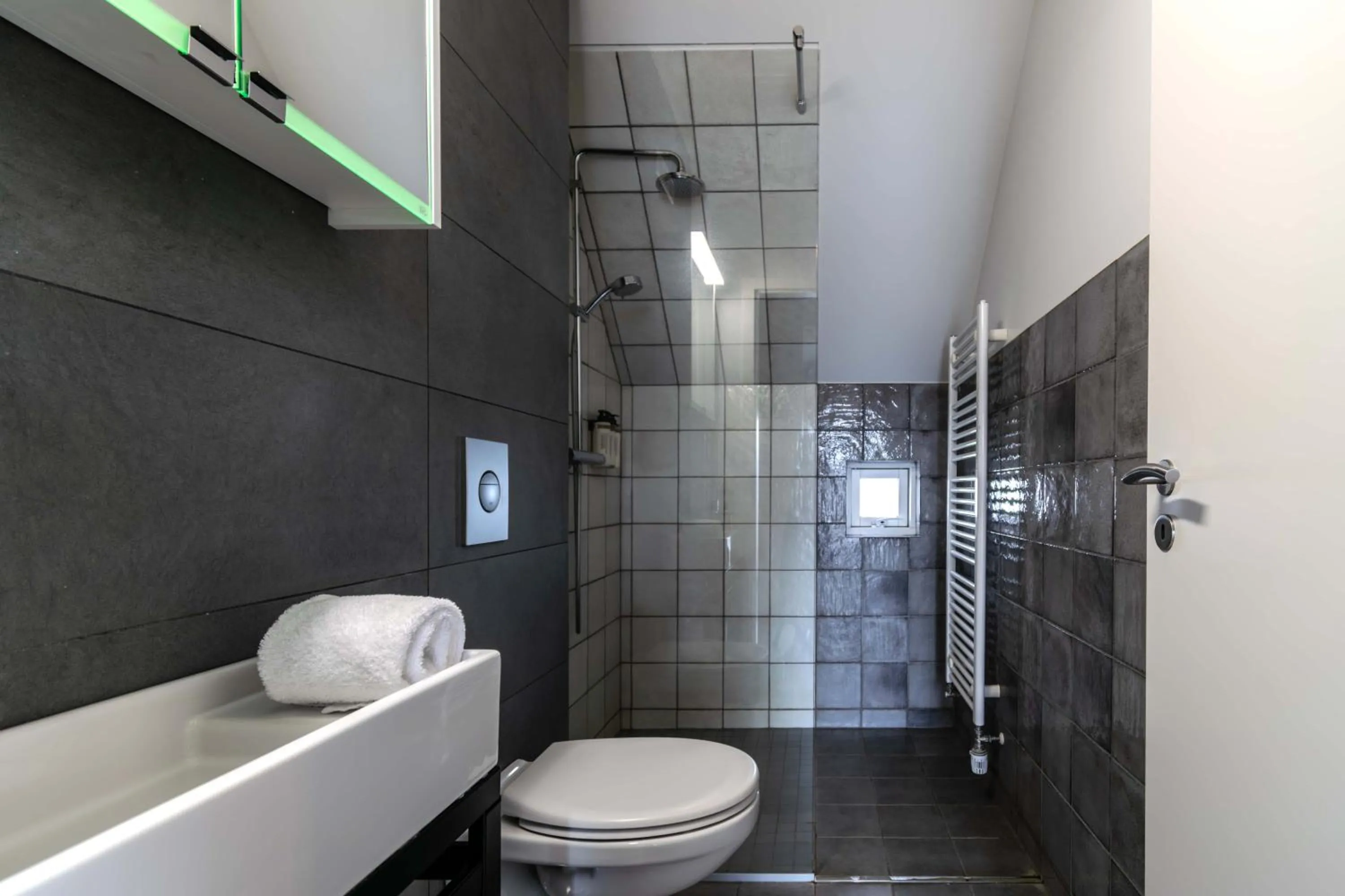 Bathroom in Saga Studios by Heimaleiga