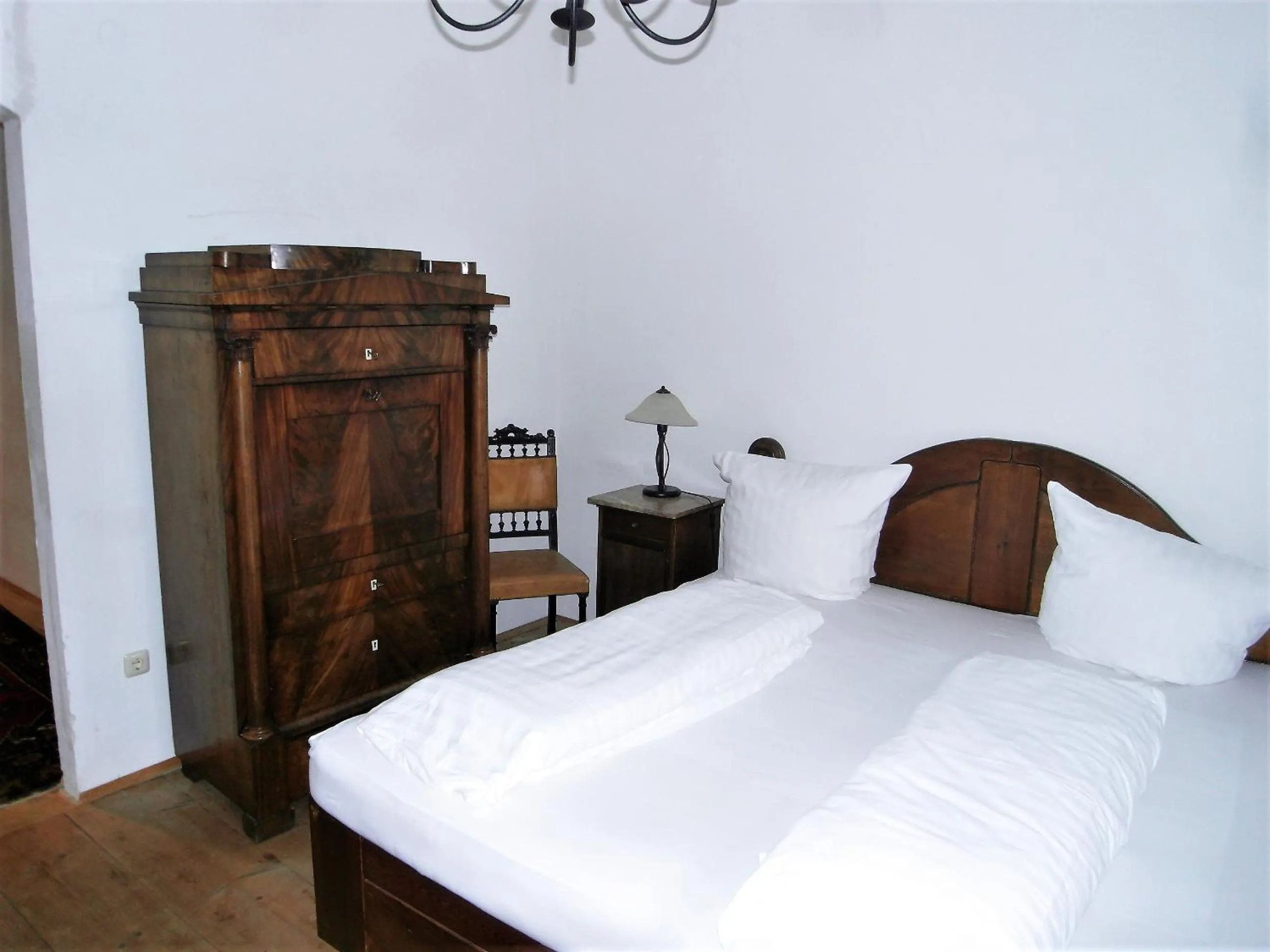 Decorative detail, Bed in Posthotel Sachrang