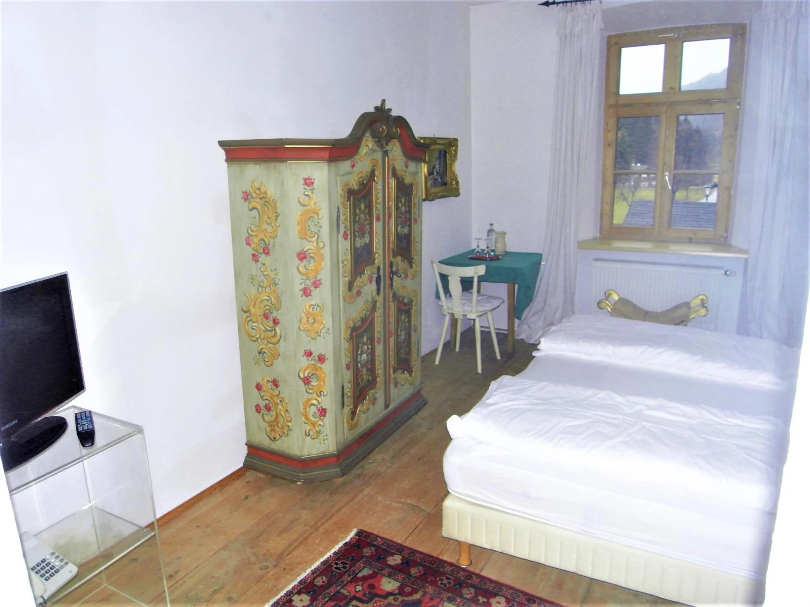Photo of the whole room, Bed in Posthotel Sachrang