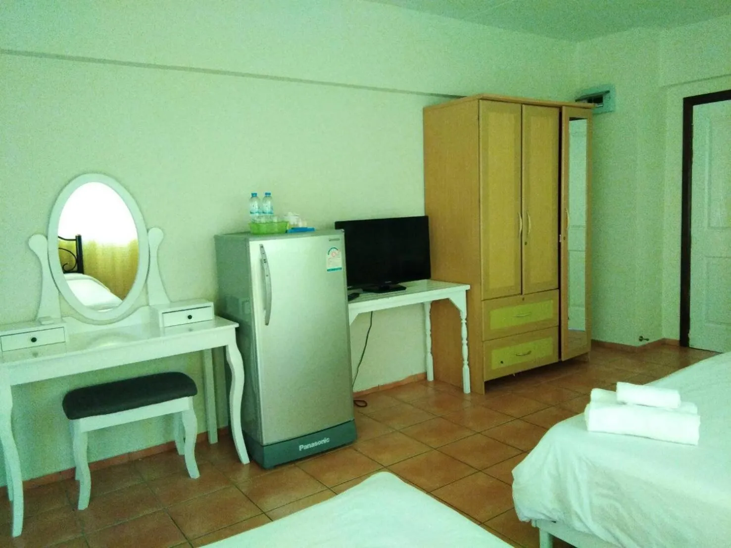 Decorative detail, Bed in Lomsabai Apartments