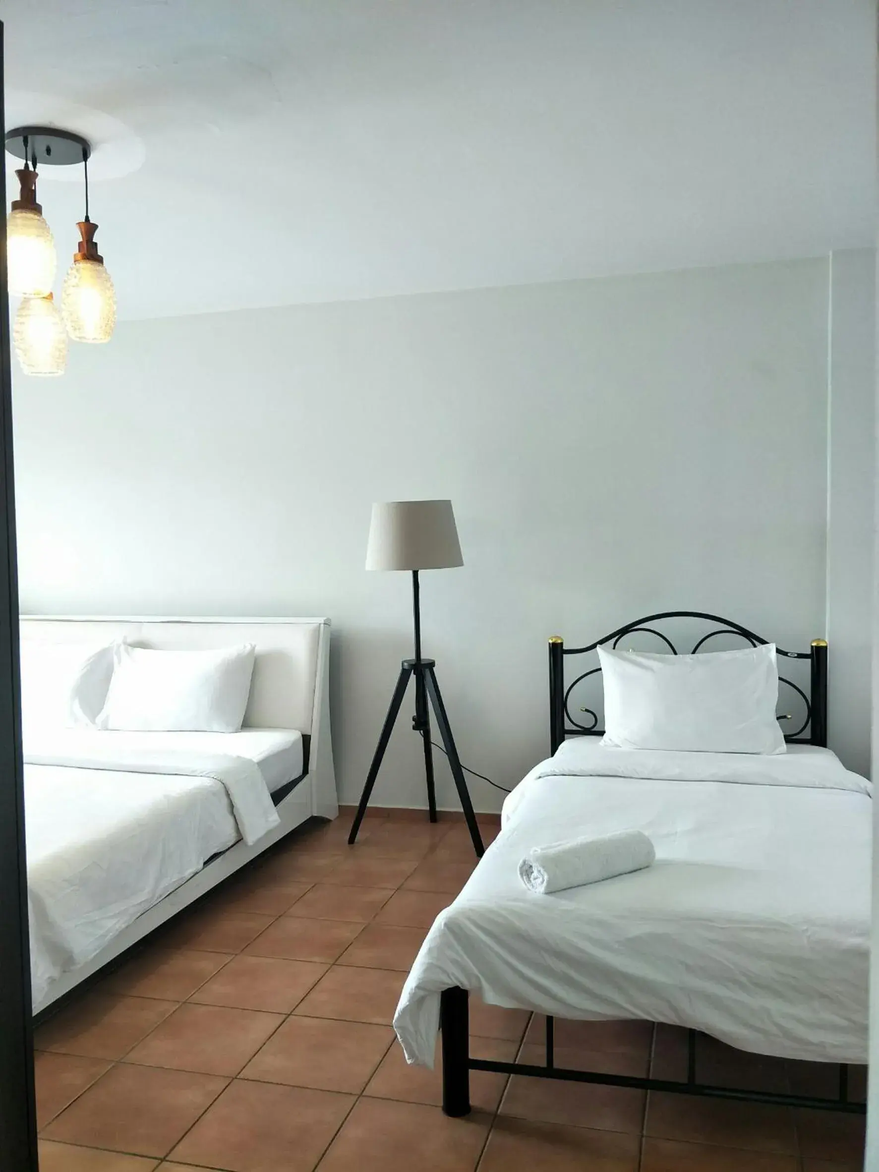 Bed in Lomsabai Apartments Bed in Lomsabai Apartments