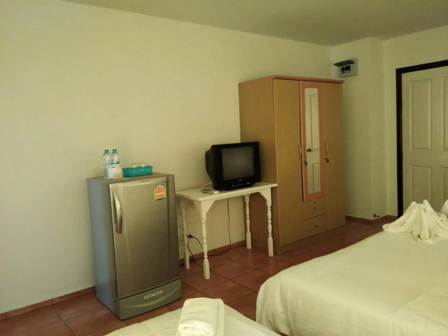 Decorative detail, Bed in Lomsabai Apartments