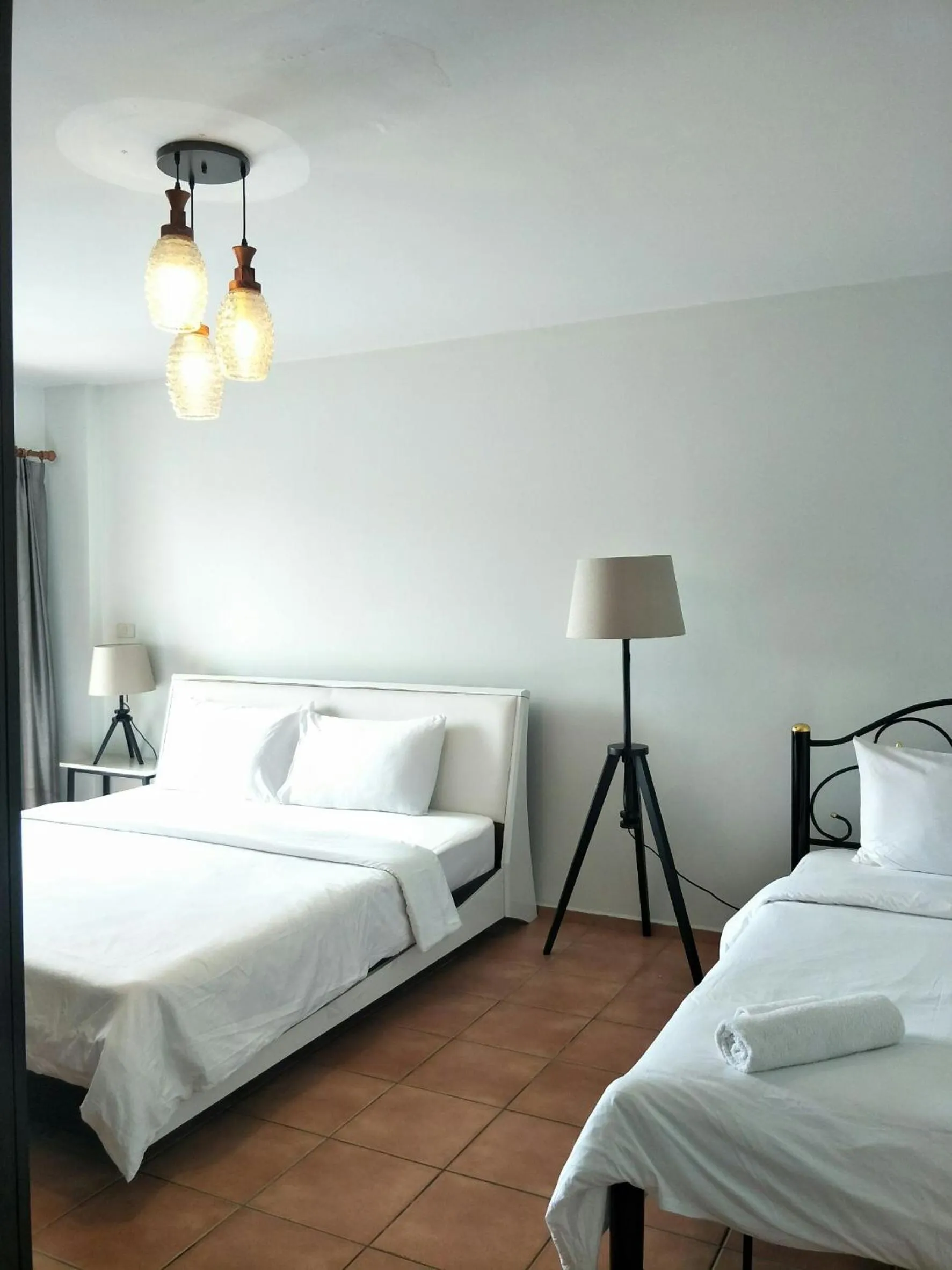 Bed in Lomsabai Apartments