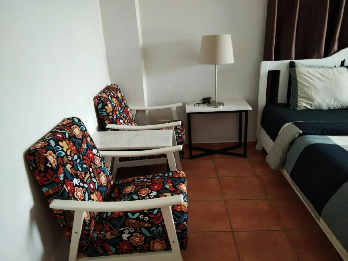 Decorative detail, Bed in Lomsabai Apartments