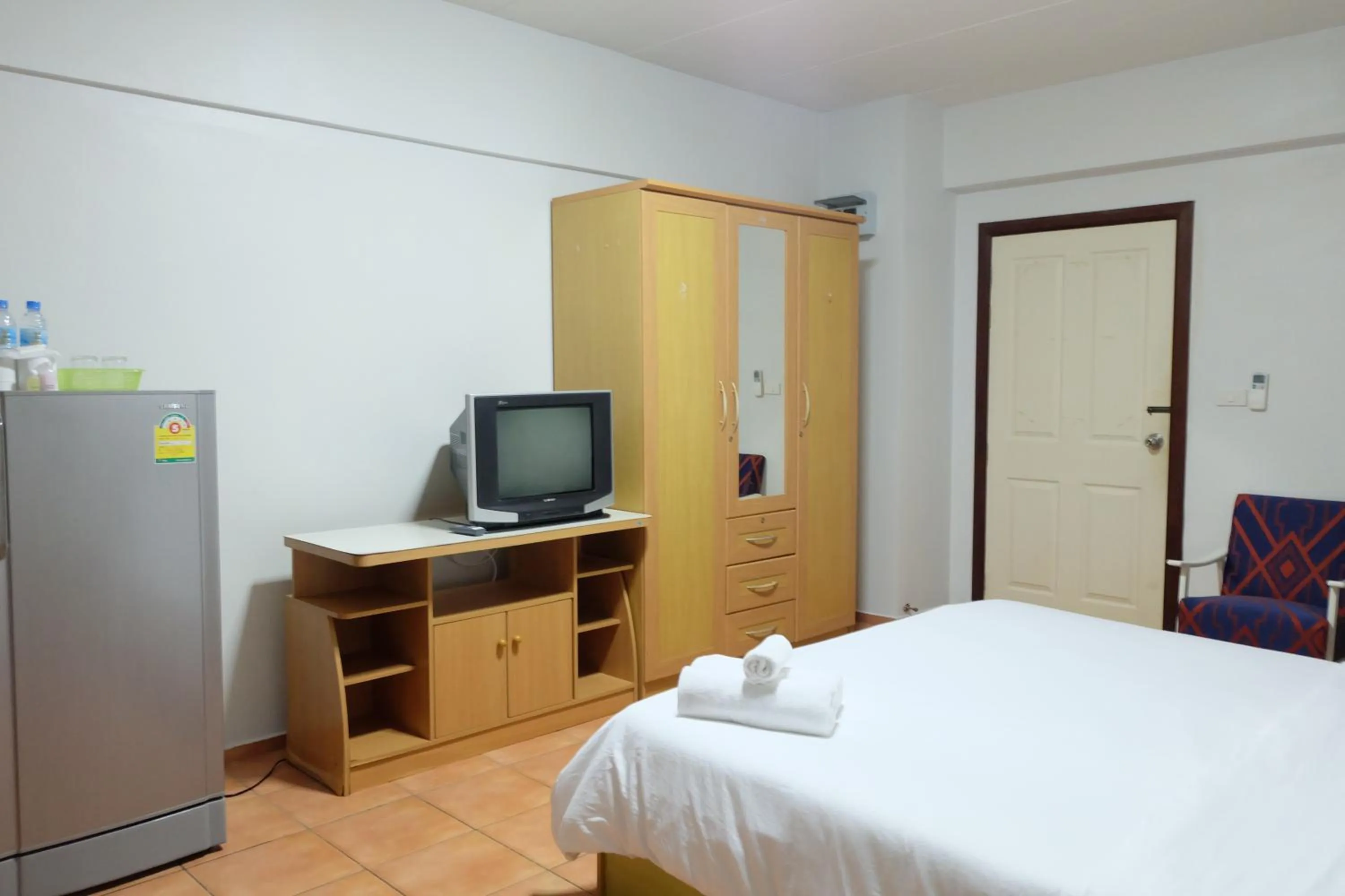 Decorative detail, Bed in Lomsabai Apartments