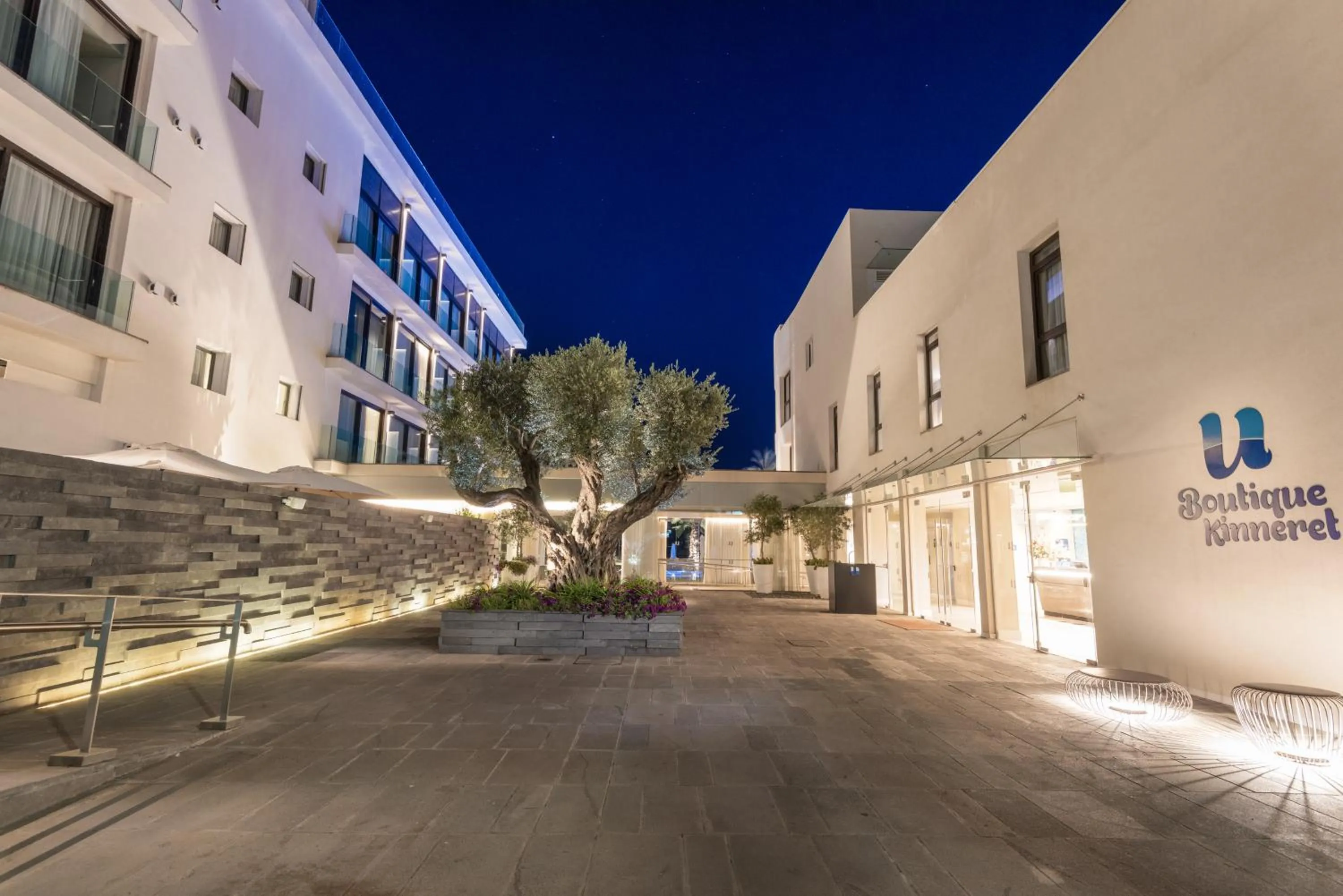 Property logo or sign in U Boutique Kinneret by the Sea of Galilee