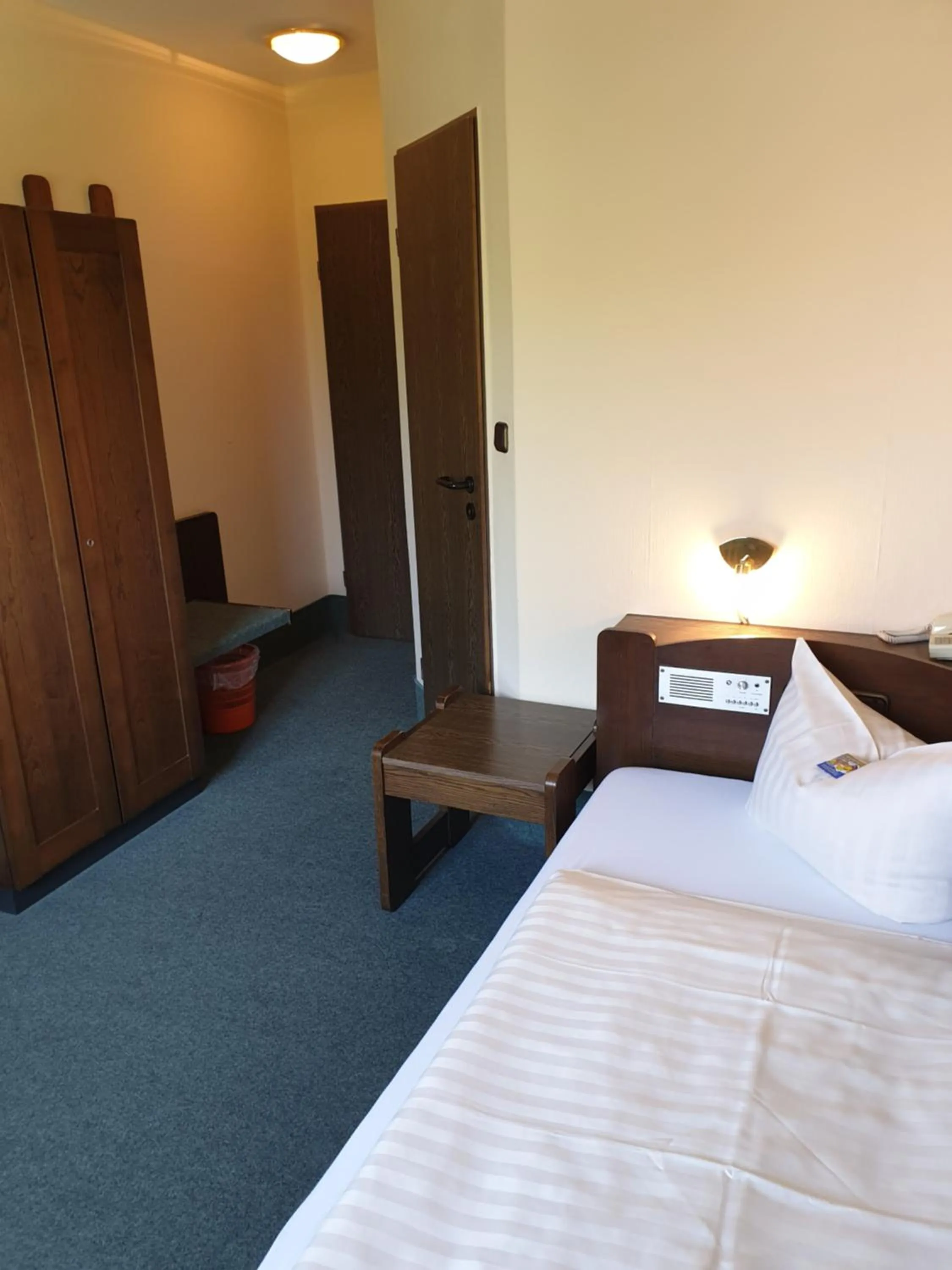 Photo of the whole room, Bed in Heidehotel Anna