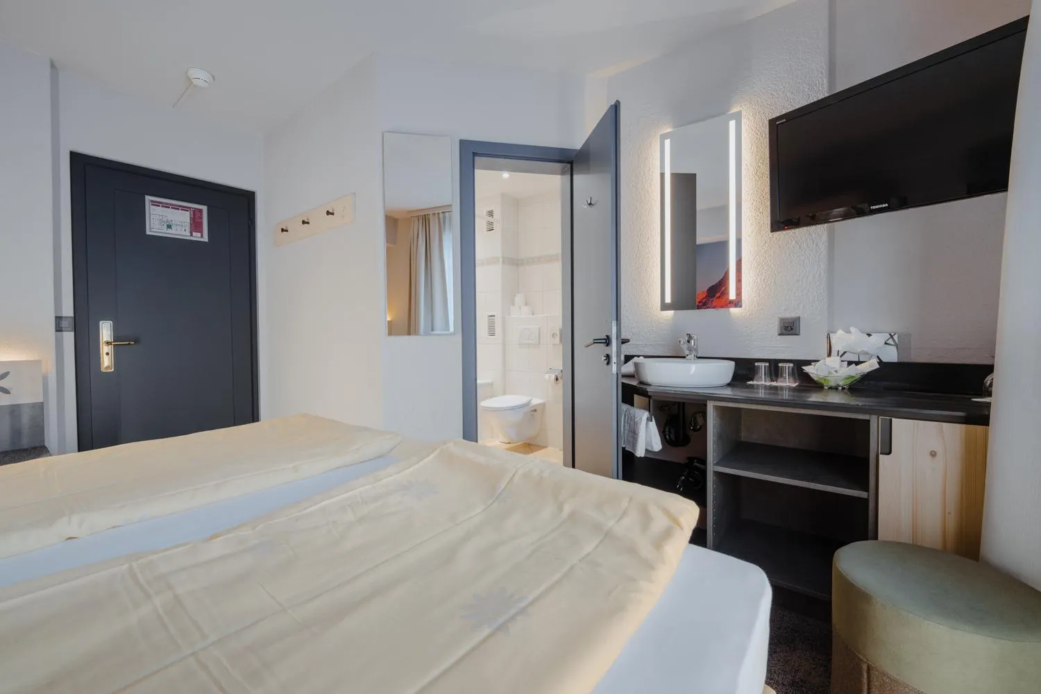 Bed in Hotel Central Wolter - Grindelwald