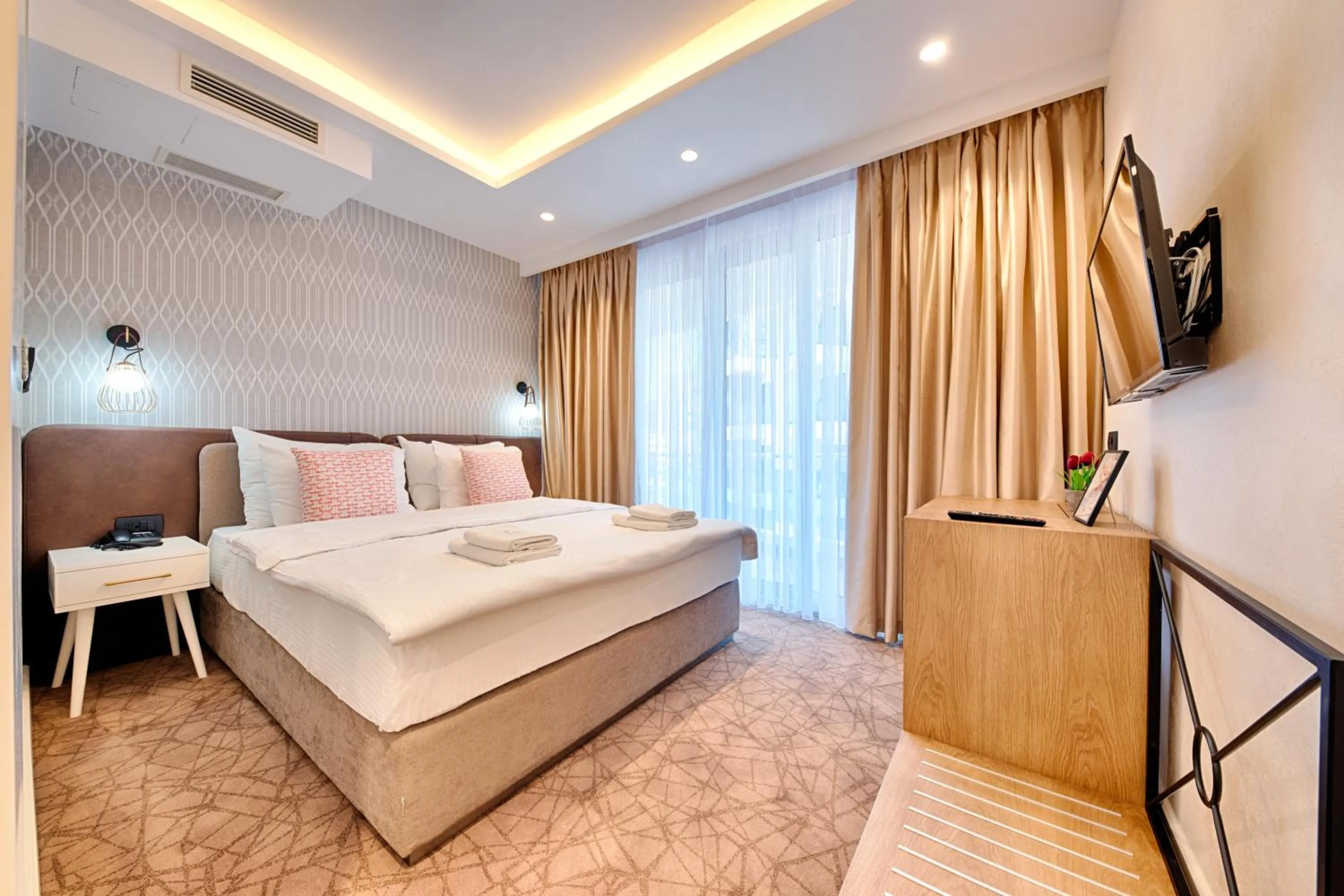 Communal lounge/ TV room, Bed in Kalamper Hotel & Spa