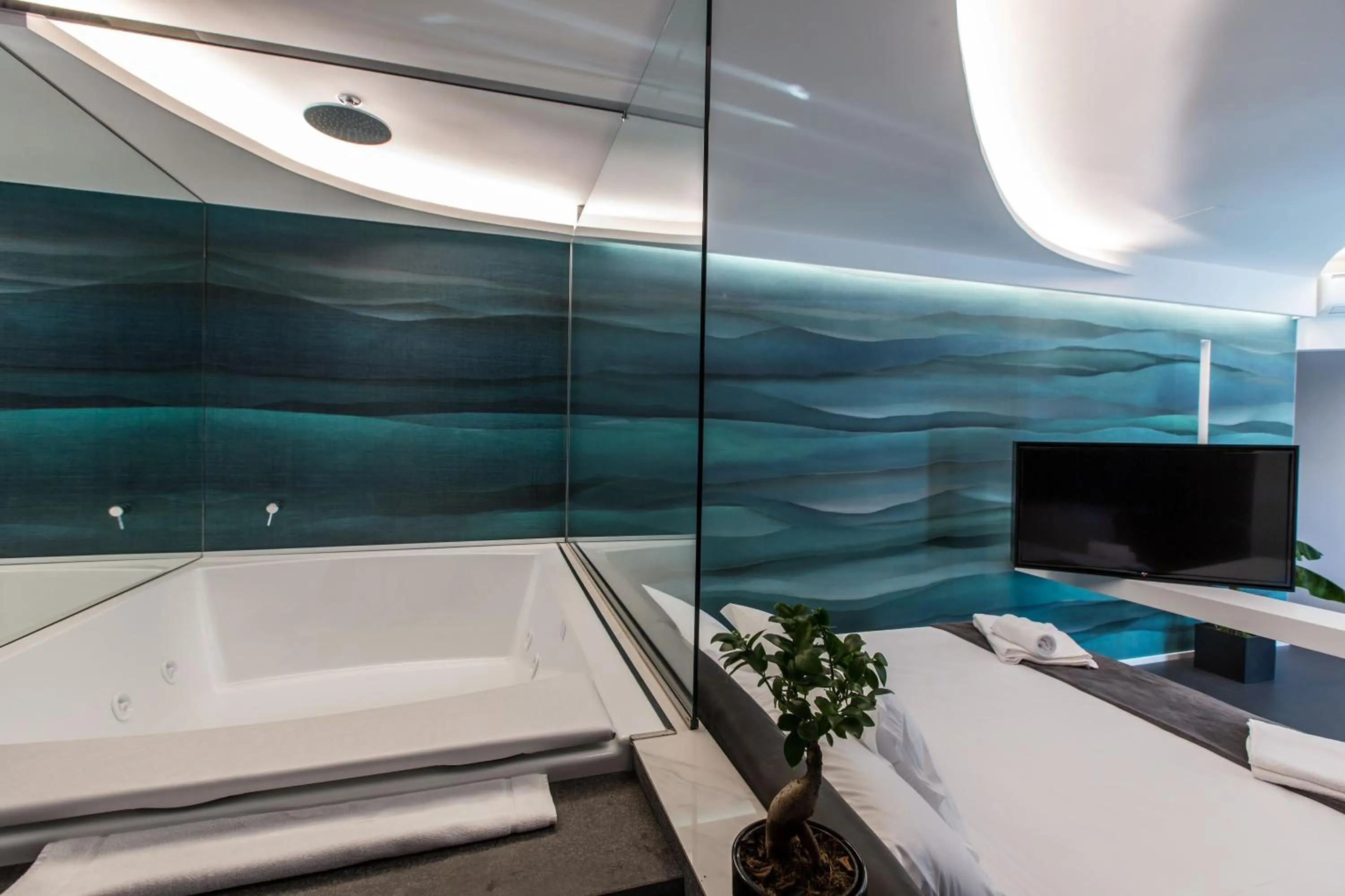 Bed in The Boutique Napoli Suite