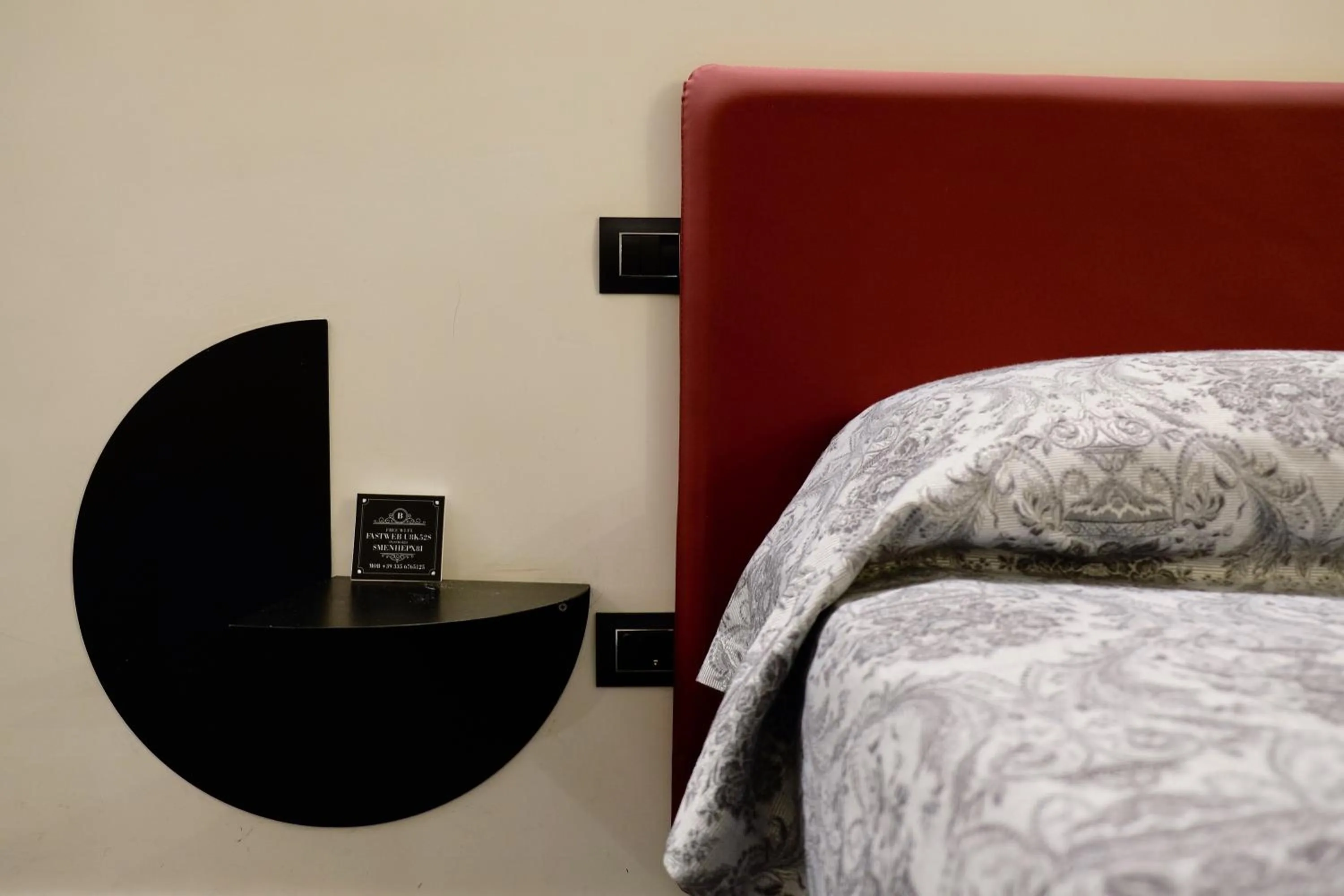 Bed in The Boutique Napoli Suite