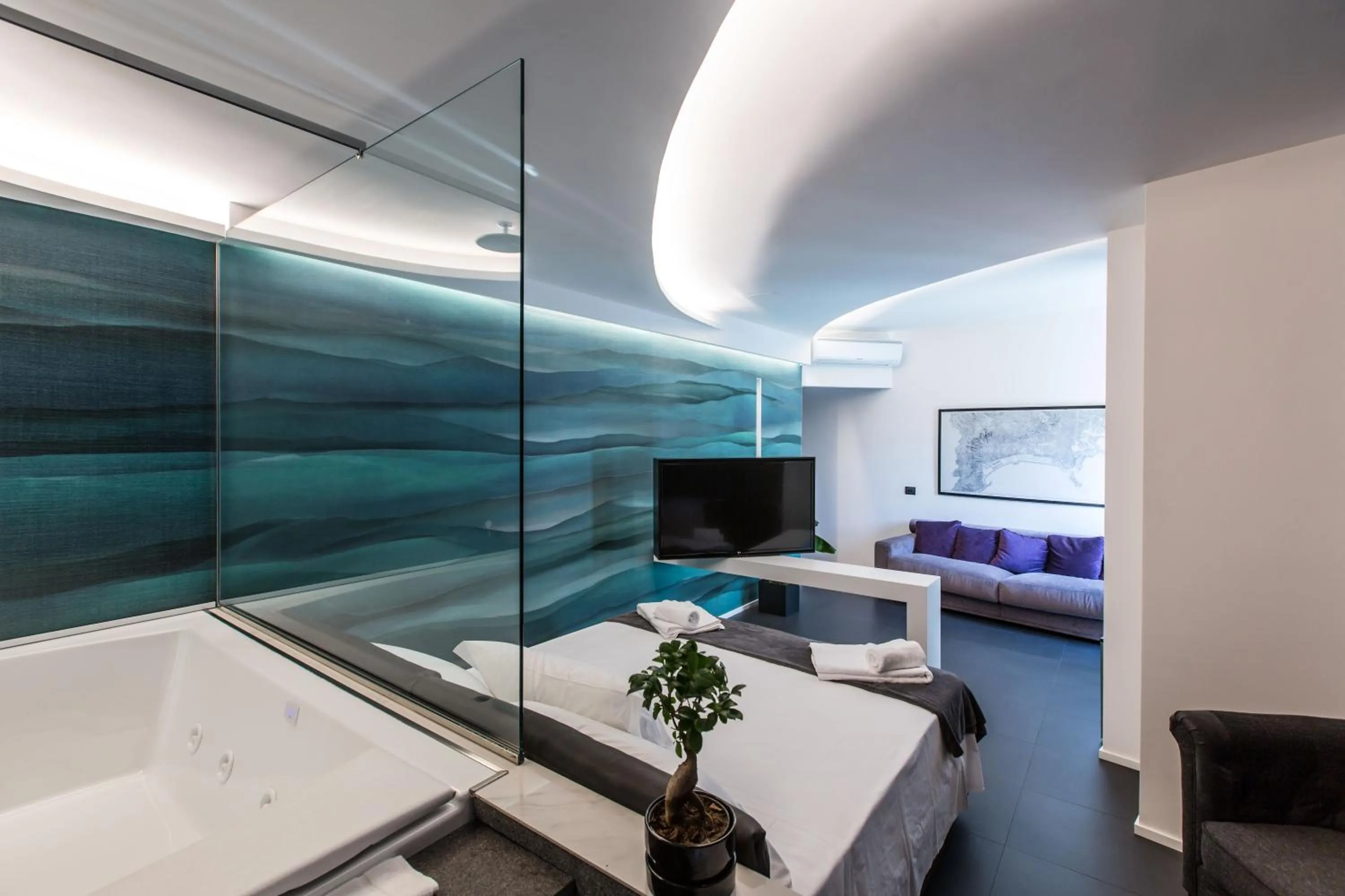 Bed in The Boutique Napoli Suite