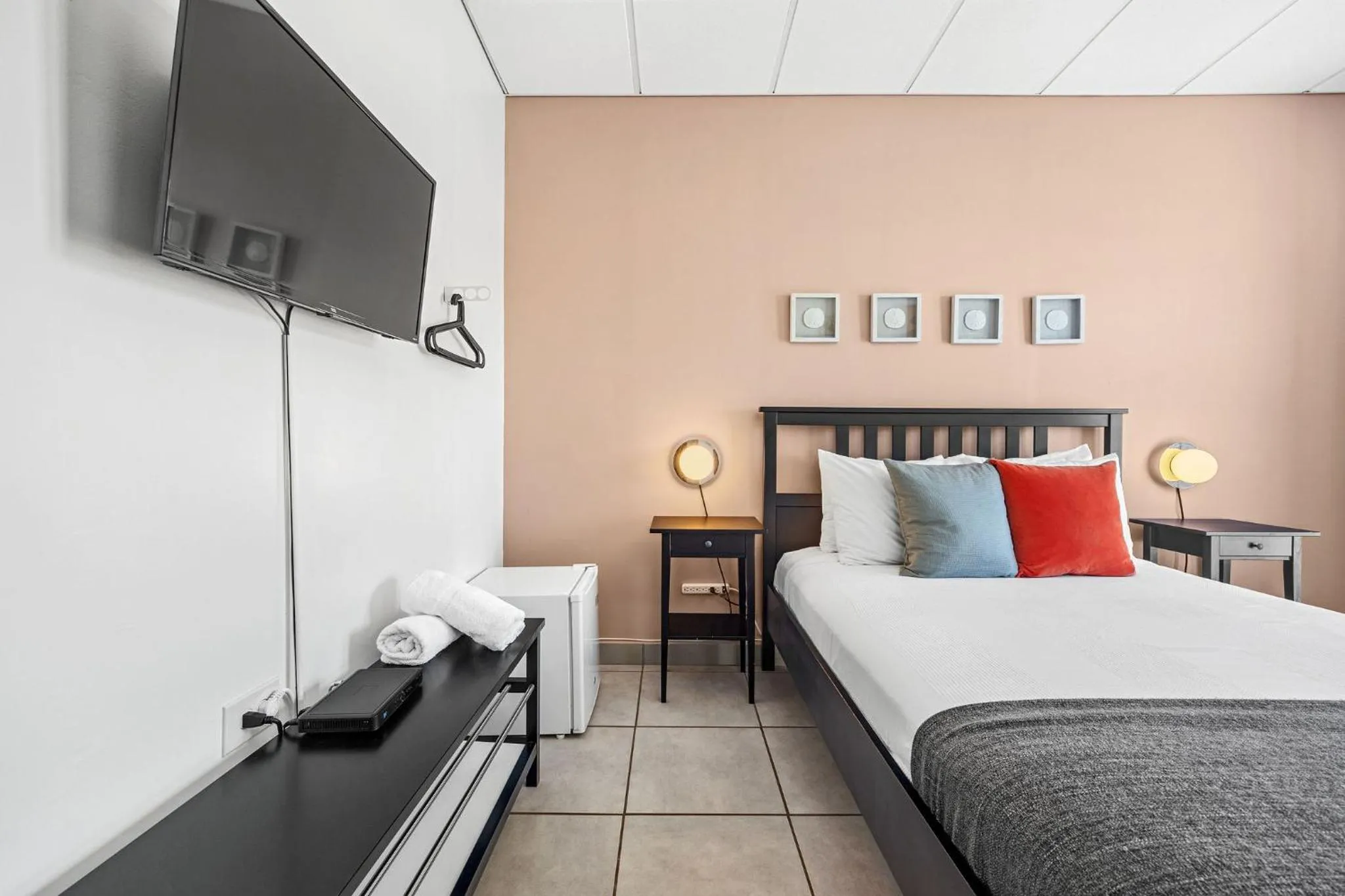 Bed in Rincon Plaza Hotel