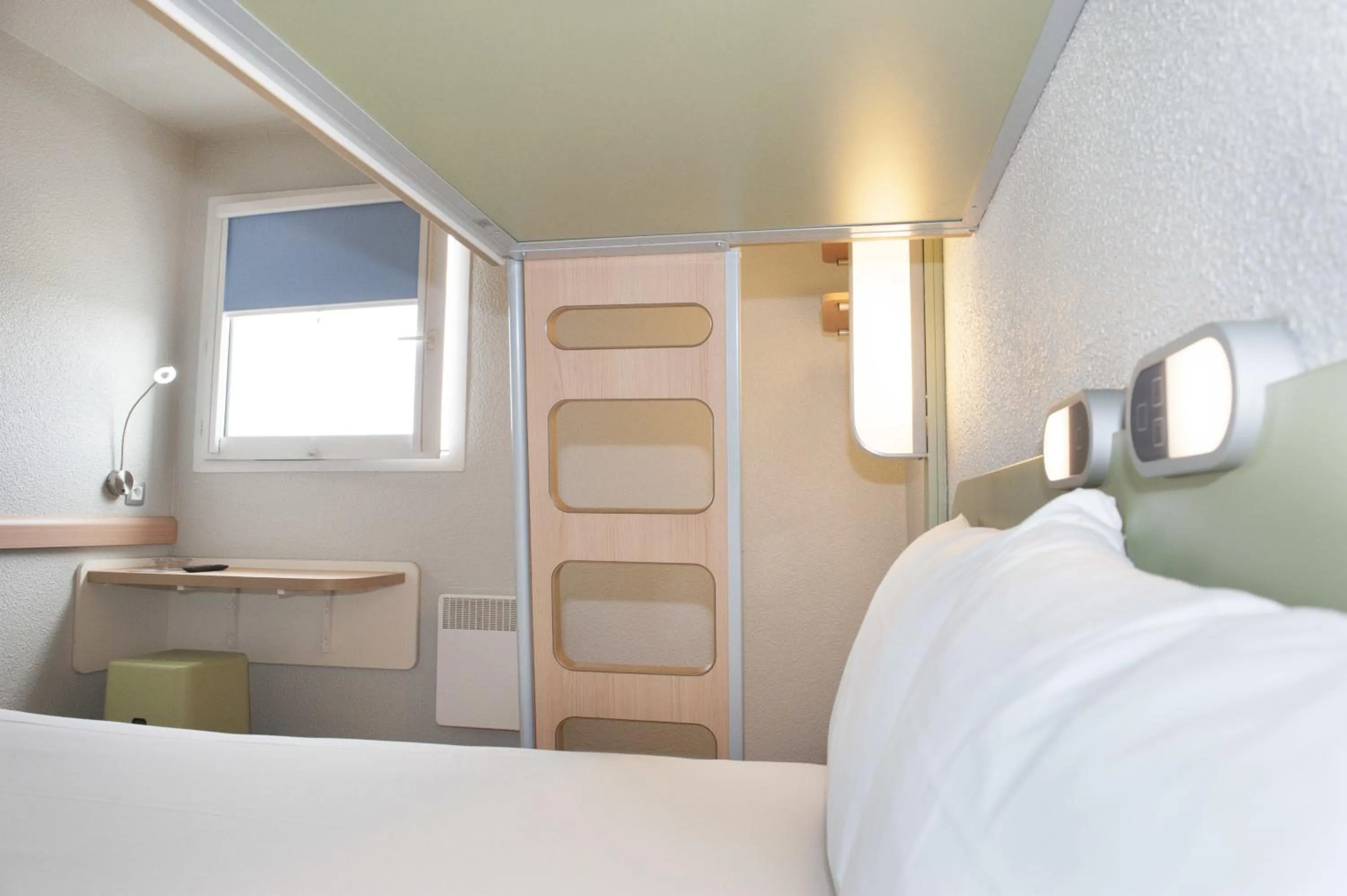 Decorative detail, Bed in ibis budget Goussainville Charles de Gaulle