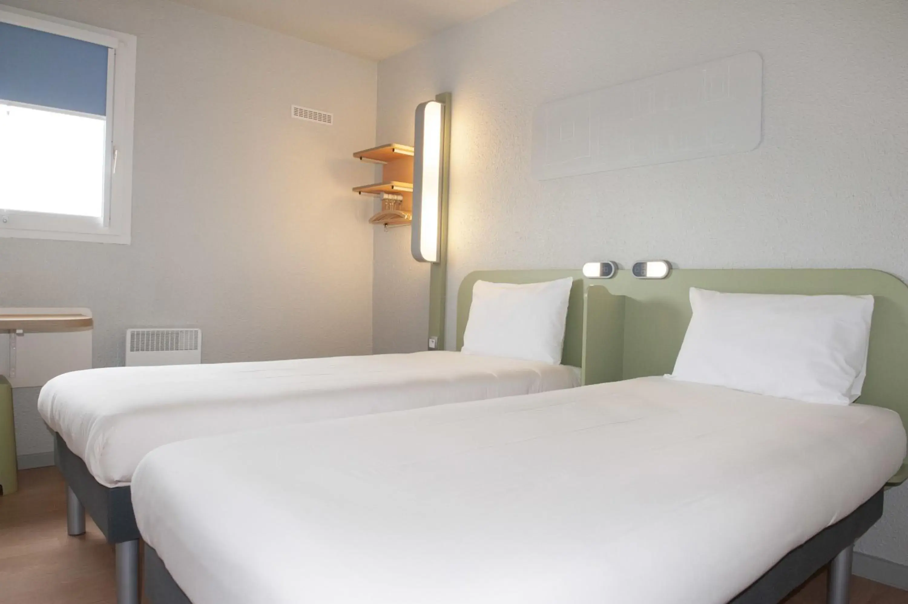 Photo of the whole room, Bed in ibis budget Goussainville Charles de Gaulle