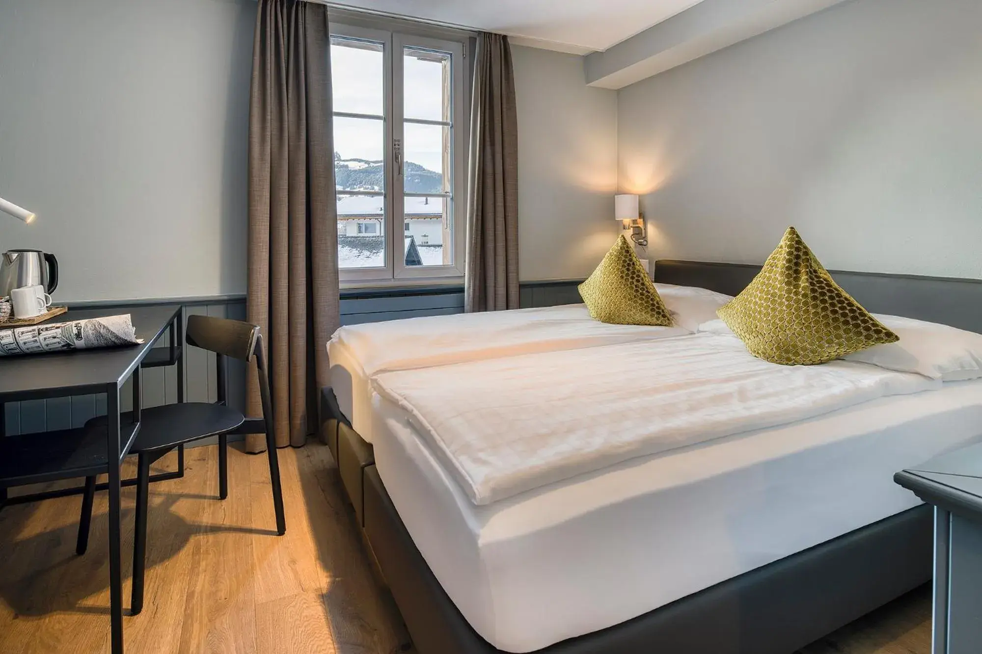 Bed in Hotel Spinne Grindelwald Bed in Hotel Spinne Grindelwald