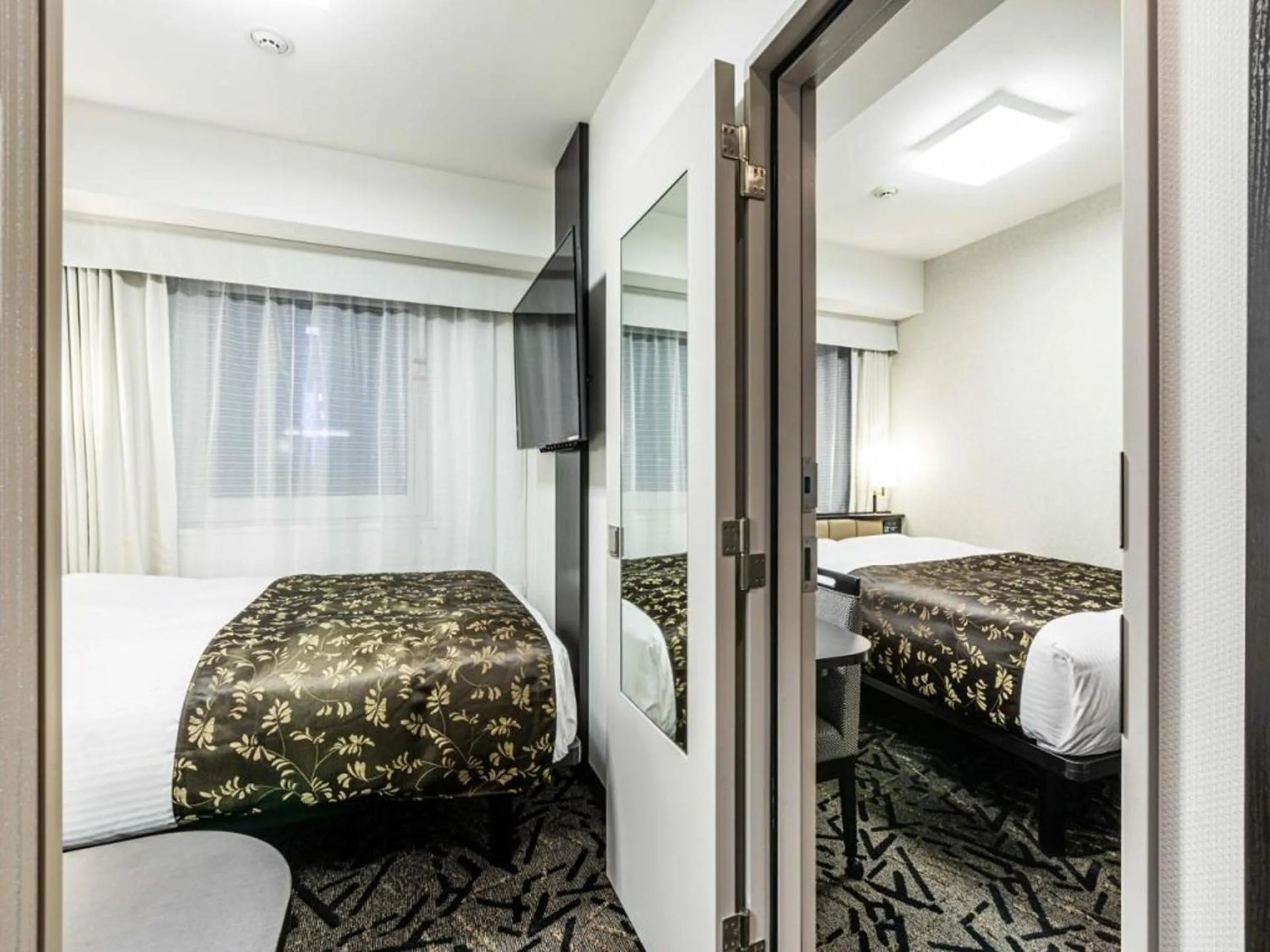 Photo of the whole room, Bed in APA Hotel Namba Ekihigashi